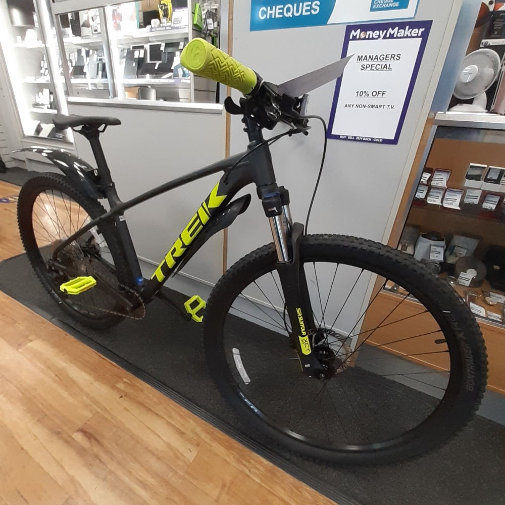 black and green trek mountain bike