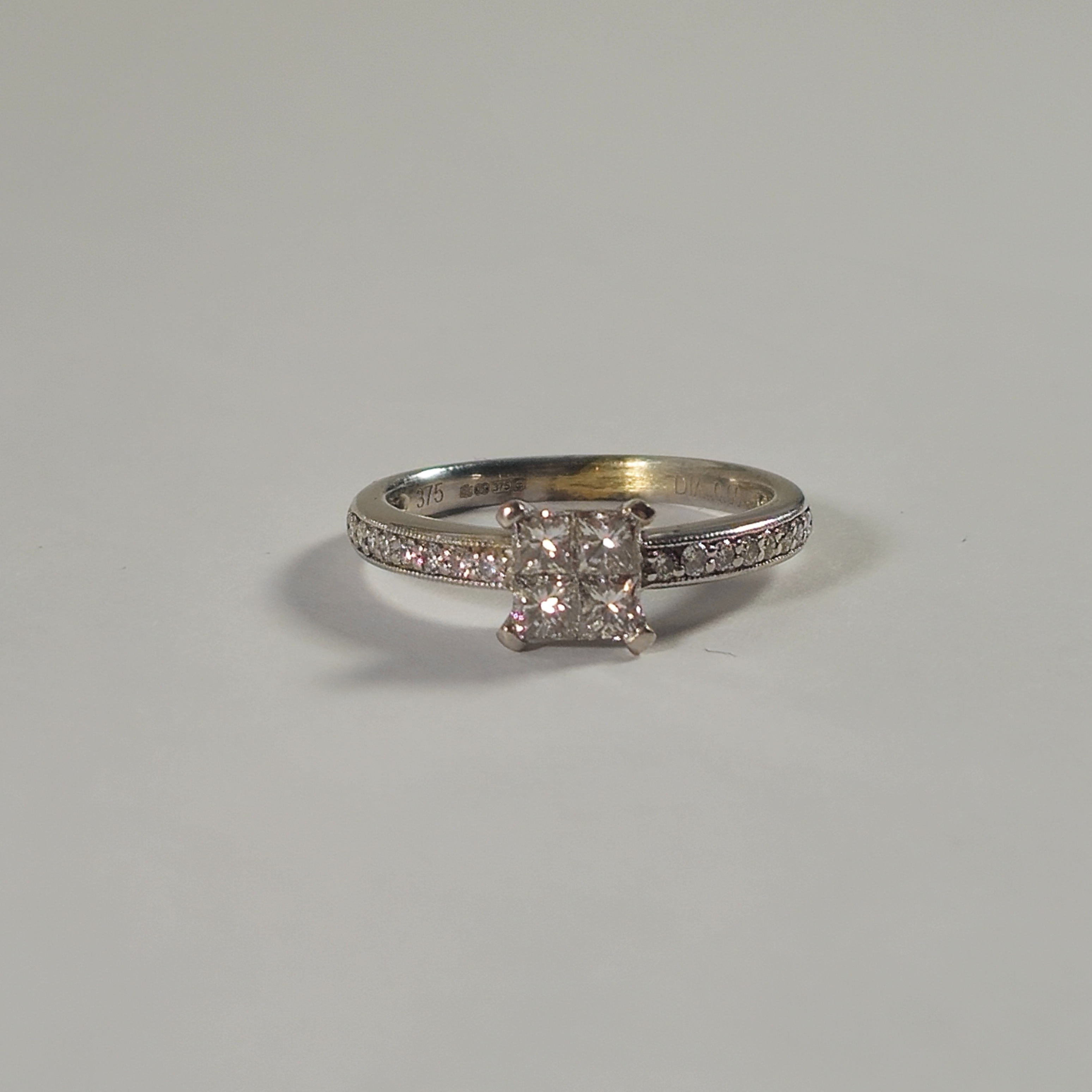 Product photo for 9ct White Gold 0.60ct Diamond Square & Round Very Sparkly Solitaire Style Engagement Ring Size K1/2