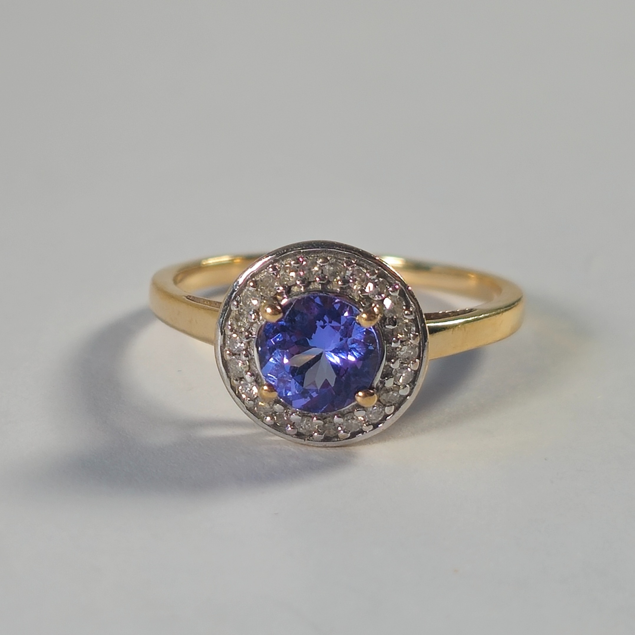 Product photo for 9ct Gold Diamond & Tanzanite Round Halo Ring Size N