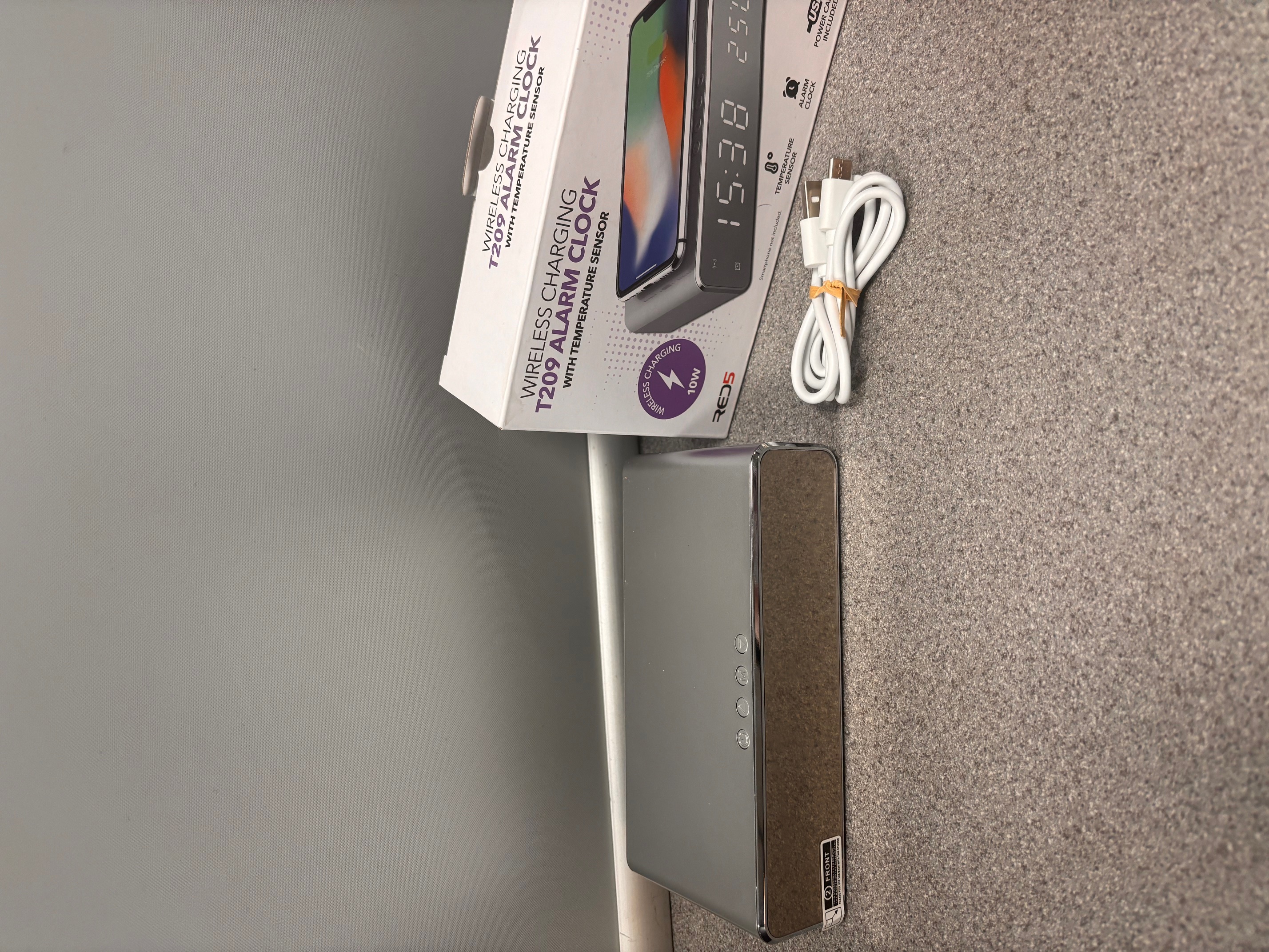 Product photo for unbranded wireless charing alarm
