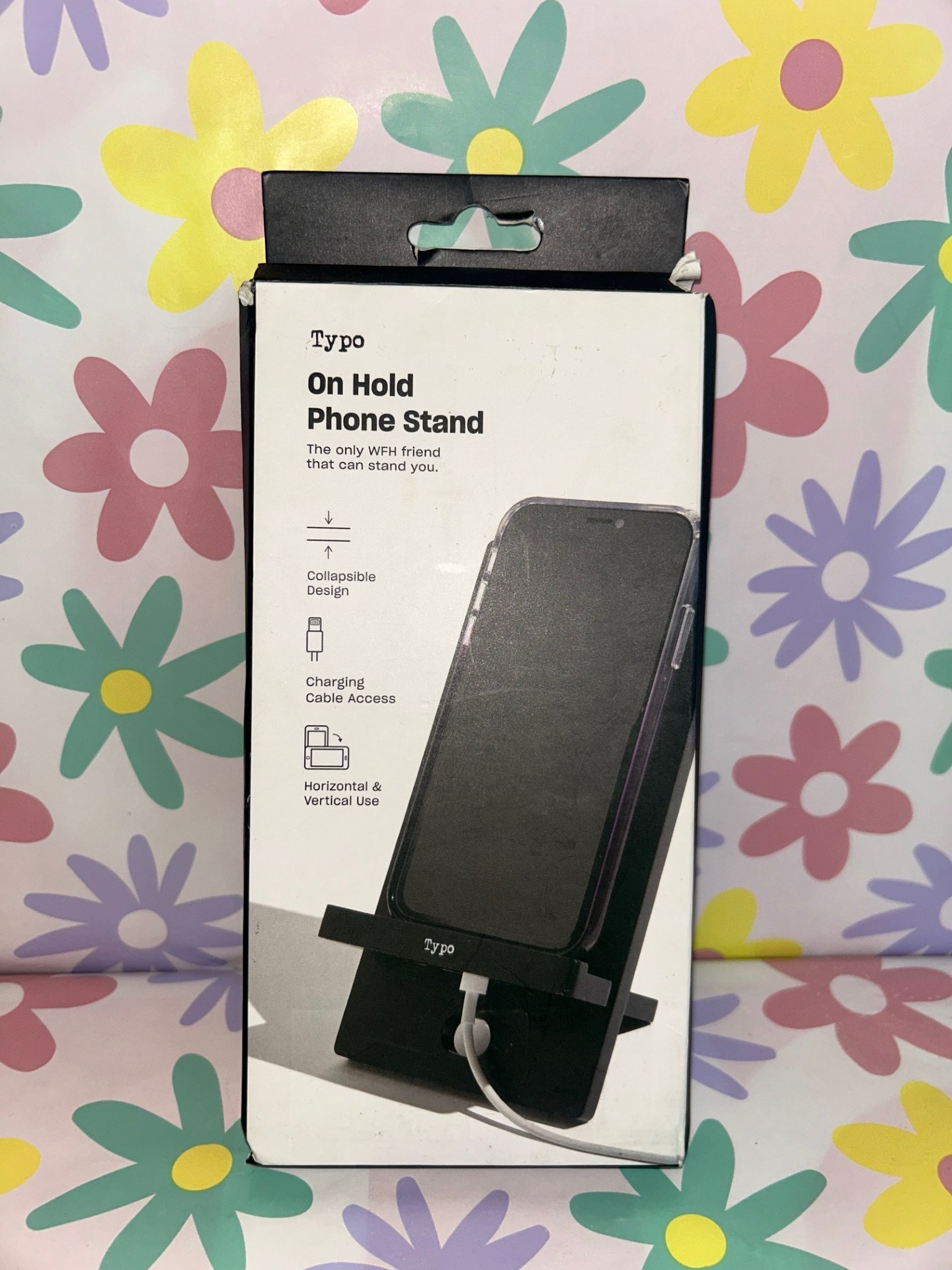Product photo for TYPO ON HOLD PHONE STAND