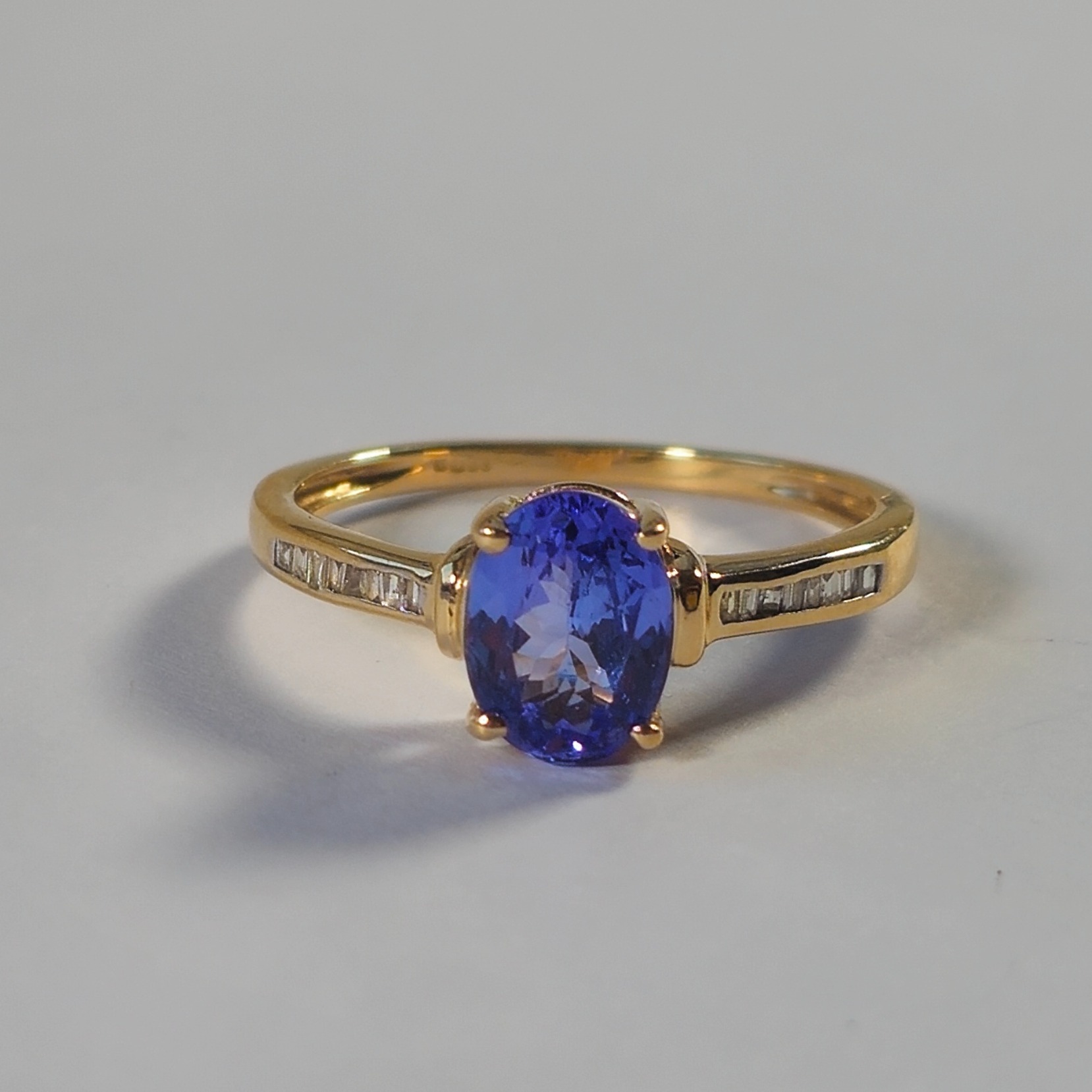 Product photo for 9ct Gold Tanzanite & Diamond Solitaire Engagement Ring Size M1/2