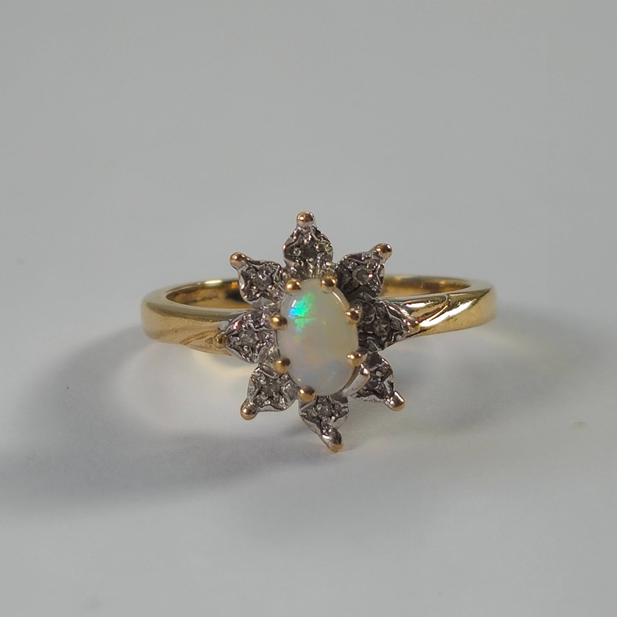 Product photo for 9ct Gold Opal & Tiny Diamond Flower Ring Size K