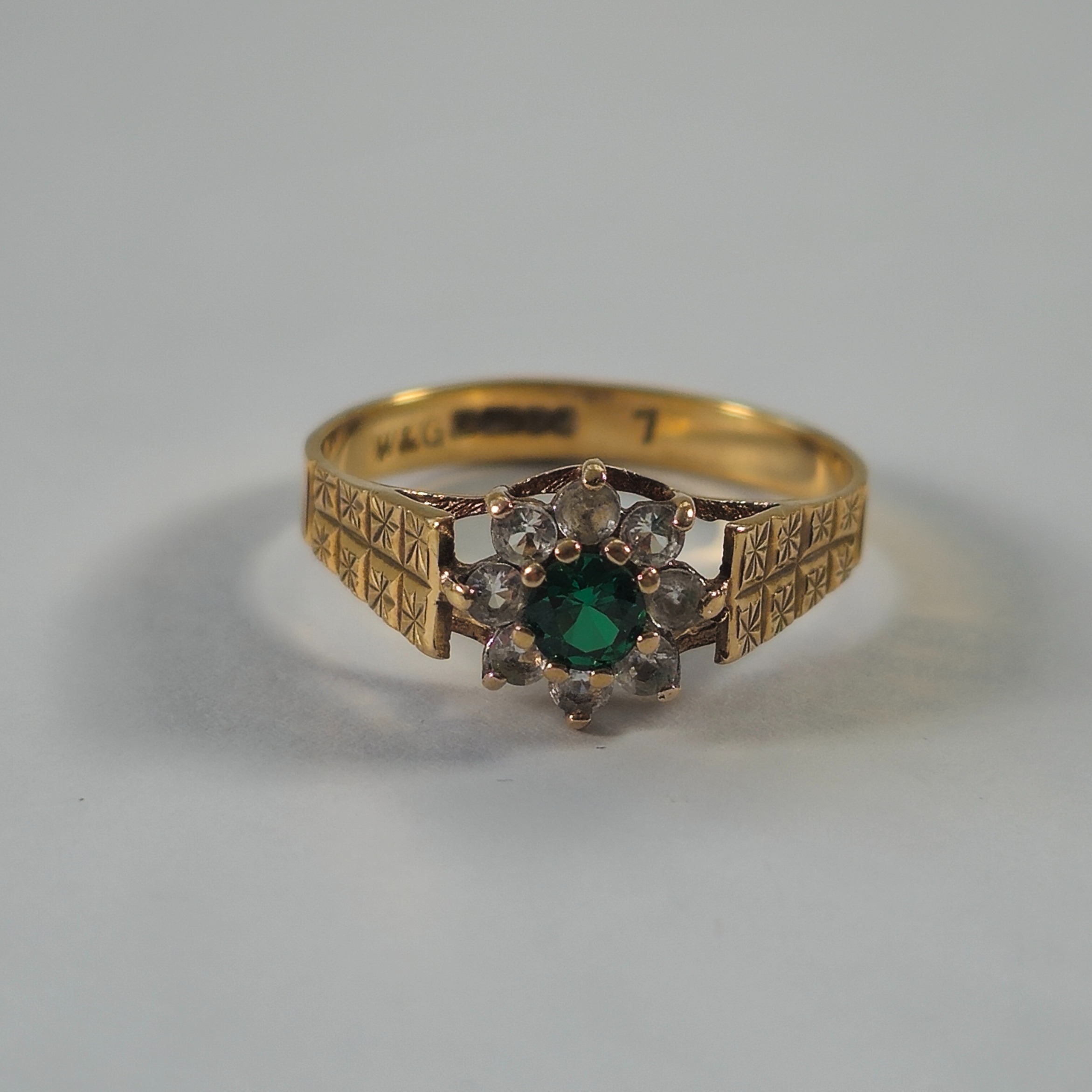 Product photo for 9ct Gold Green & White Stone Flower Ring Size N