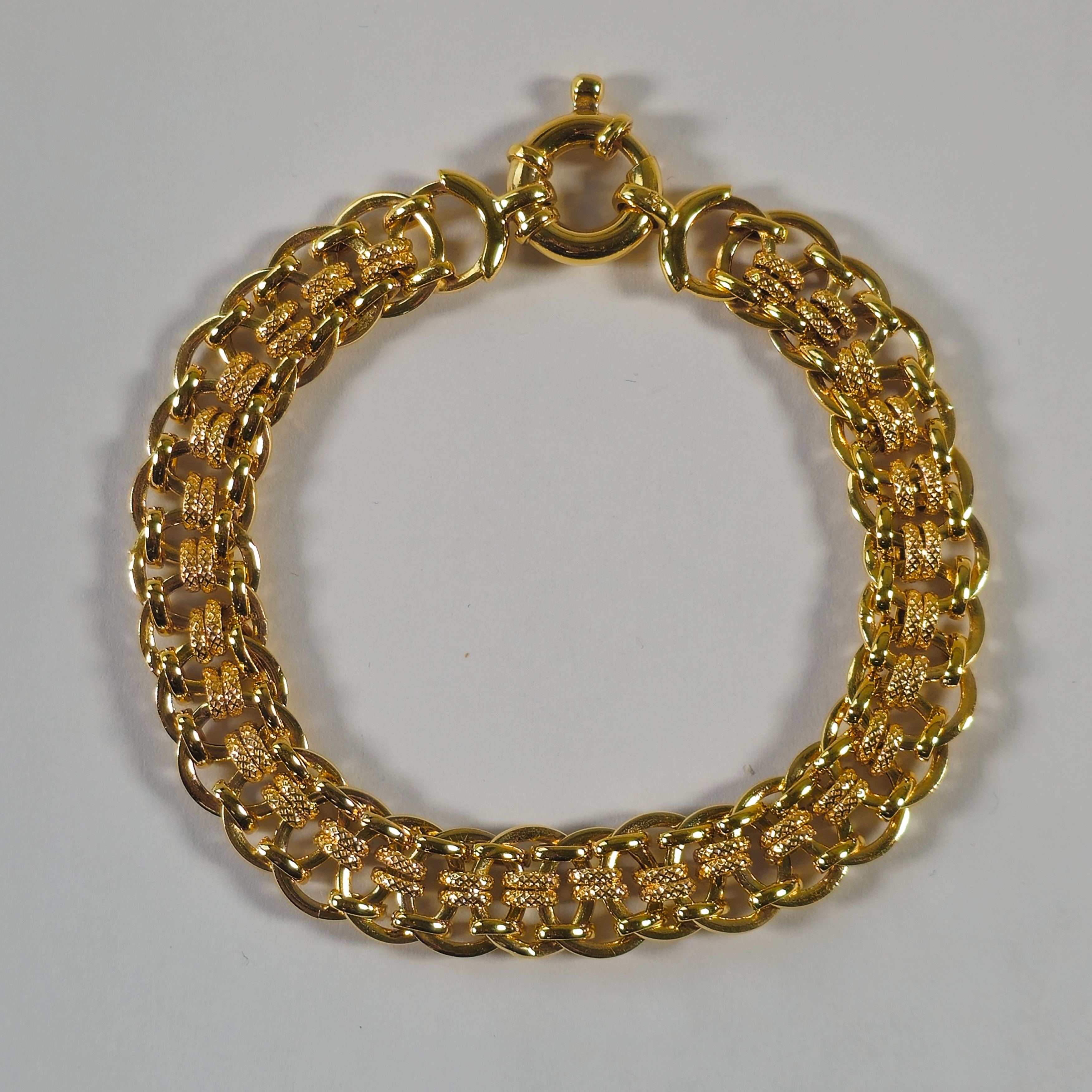 Product photo for 9ct Gold Fancy Link Flat Bracelet 7.6