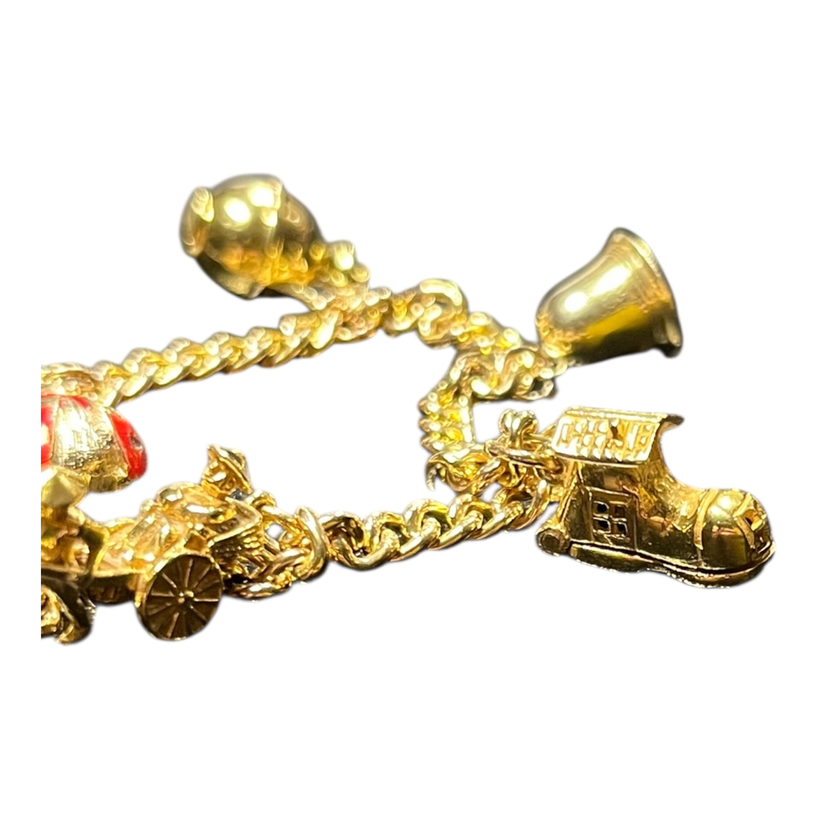 Product photo for 9ct Gold Curb Bracelet with 6 Charms – 7