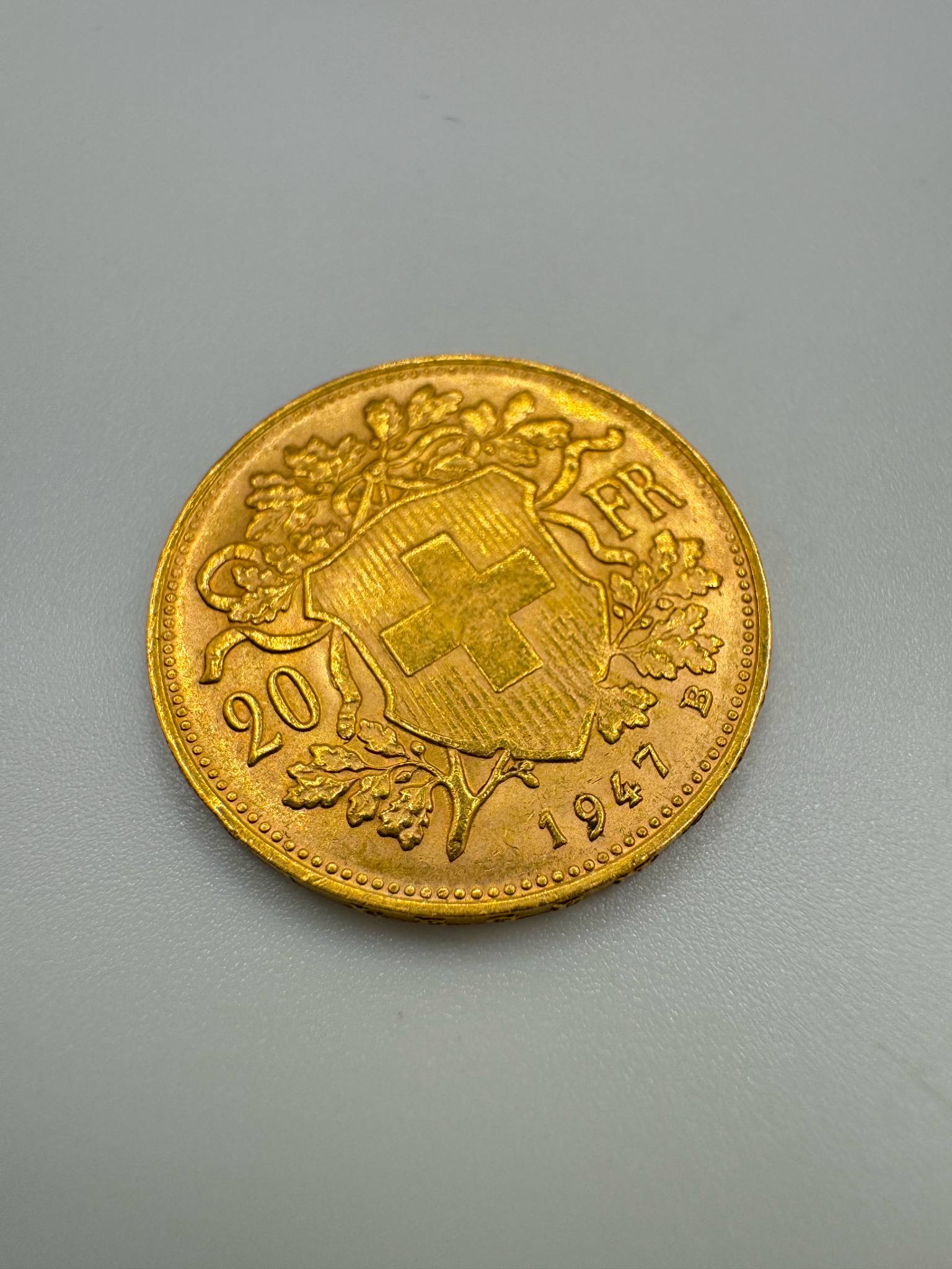 Product photo for Gold Swiss 20 Franc 1947 Coin