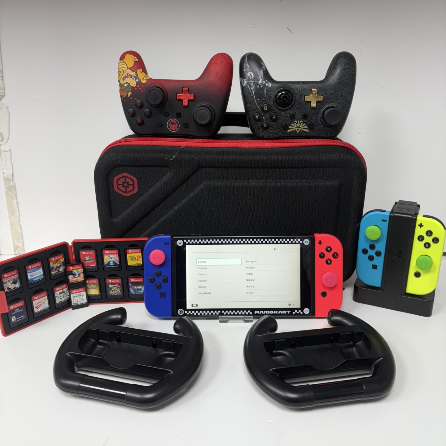 Product photo for NINTENDO SWITCH MEGA BUNDLE WITH 4 JOY CONS 14 GAMES CHARGER TWO CONTROLLERS IN BLACK CASE