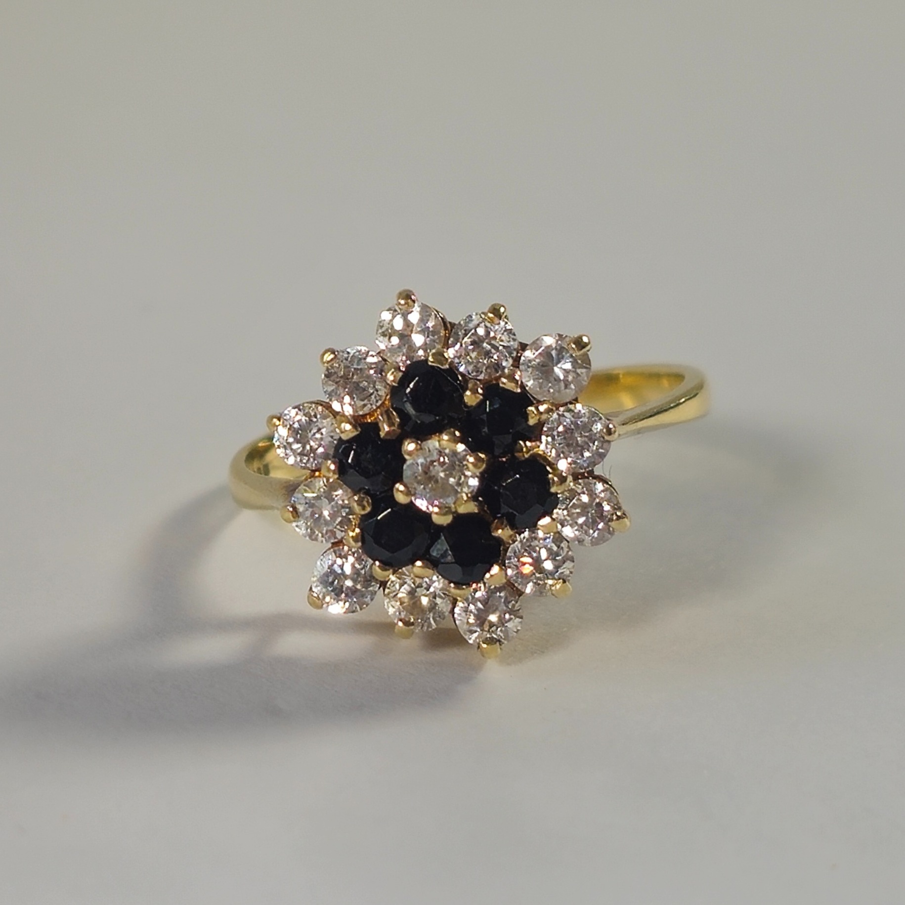 Product photo for 9ct Gold Black & White *CZ* Layered Flower Ring Size O1/2