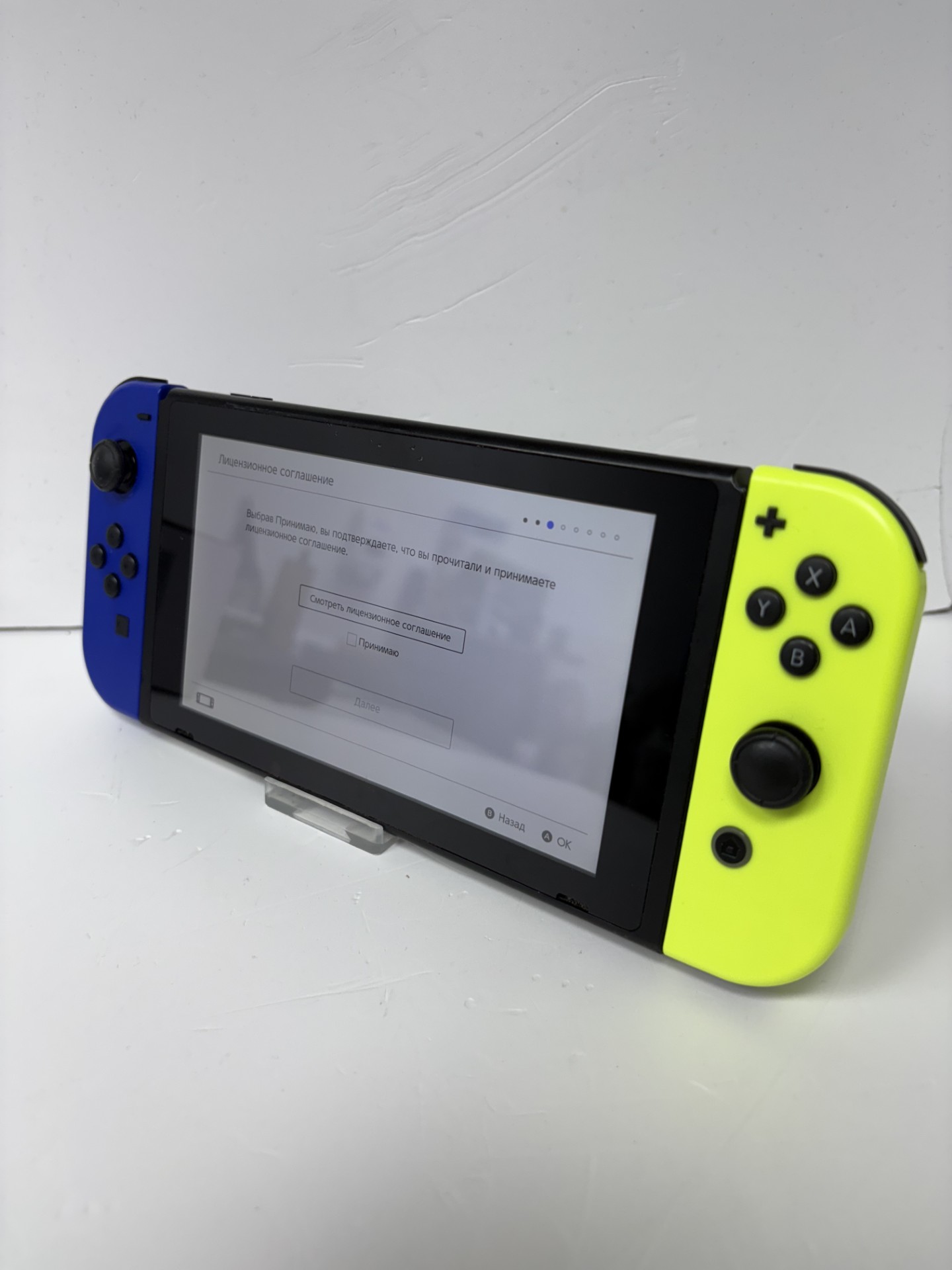 Product photo for NINTENDO SWITCH BLACK BLUE/YELLOW JOY CONS WITH 9 GAMES IN CASE UNBOXED