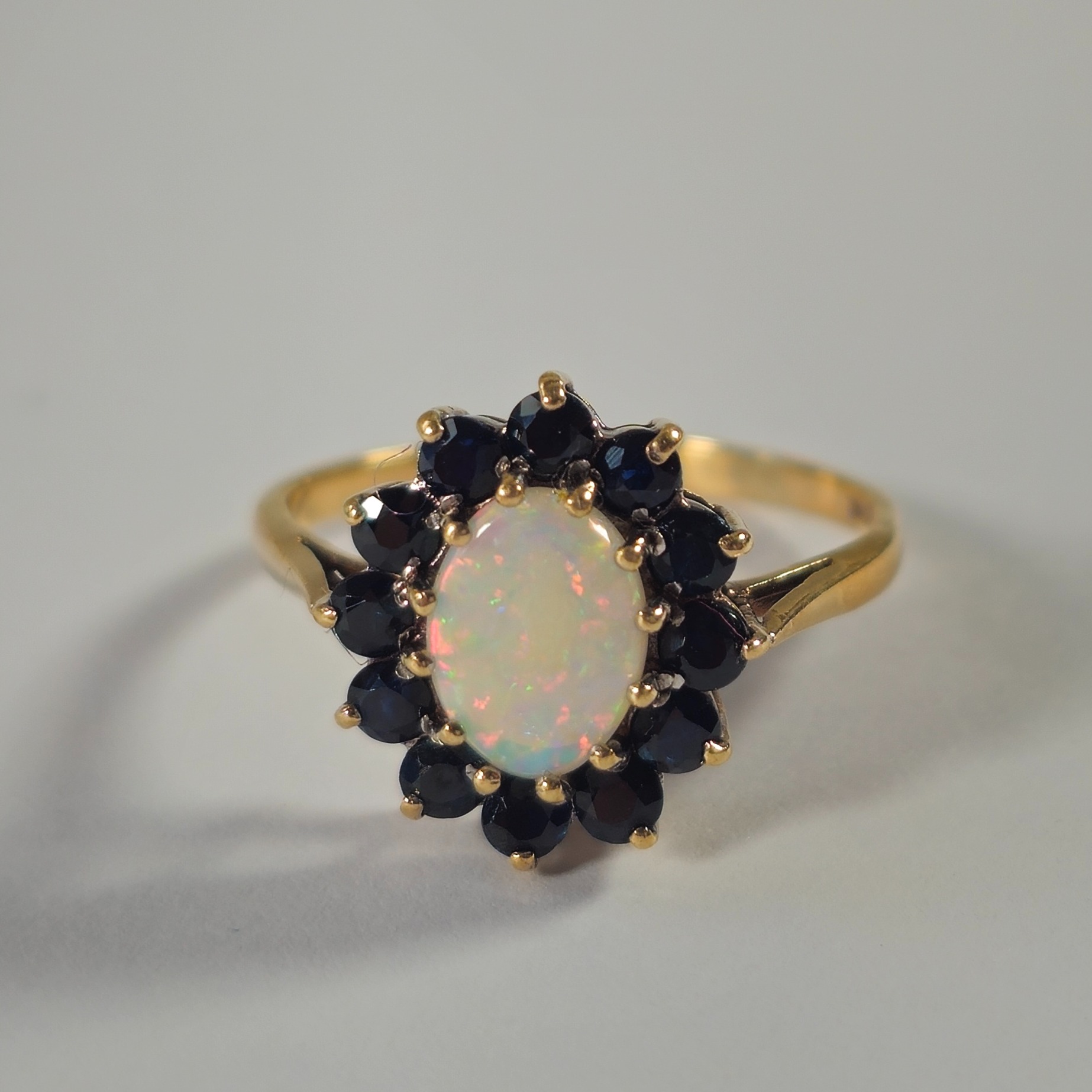 Product photo for 9ct Gold Opal & Blue Sapphire Flower Ring Size P1/2