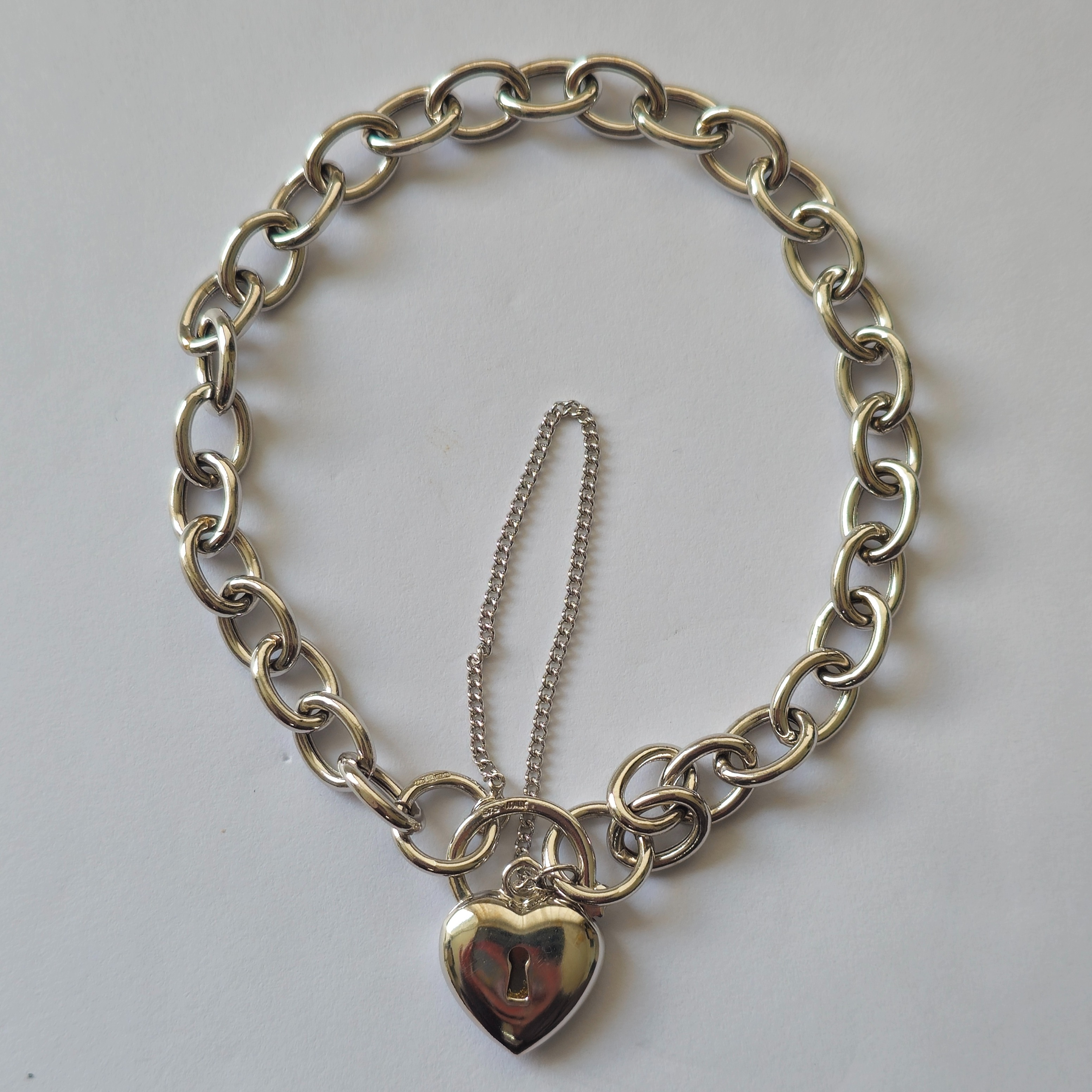 Product photo for 9ct White Gold Hollow Cable Link Heart Padlock Bracelet