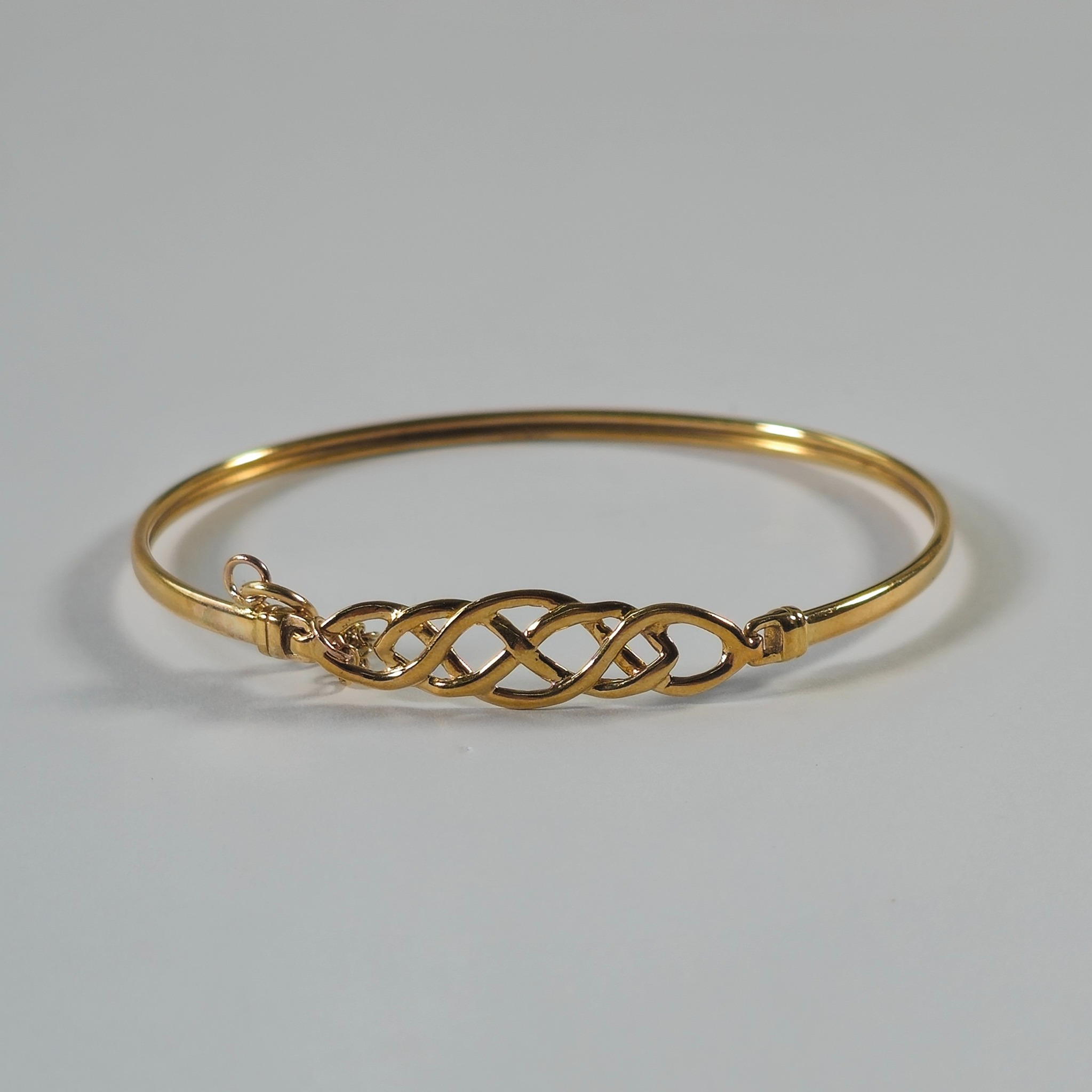 Product photo for 9ct Gold Celtic Bangle with Safety Chain