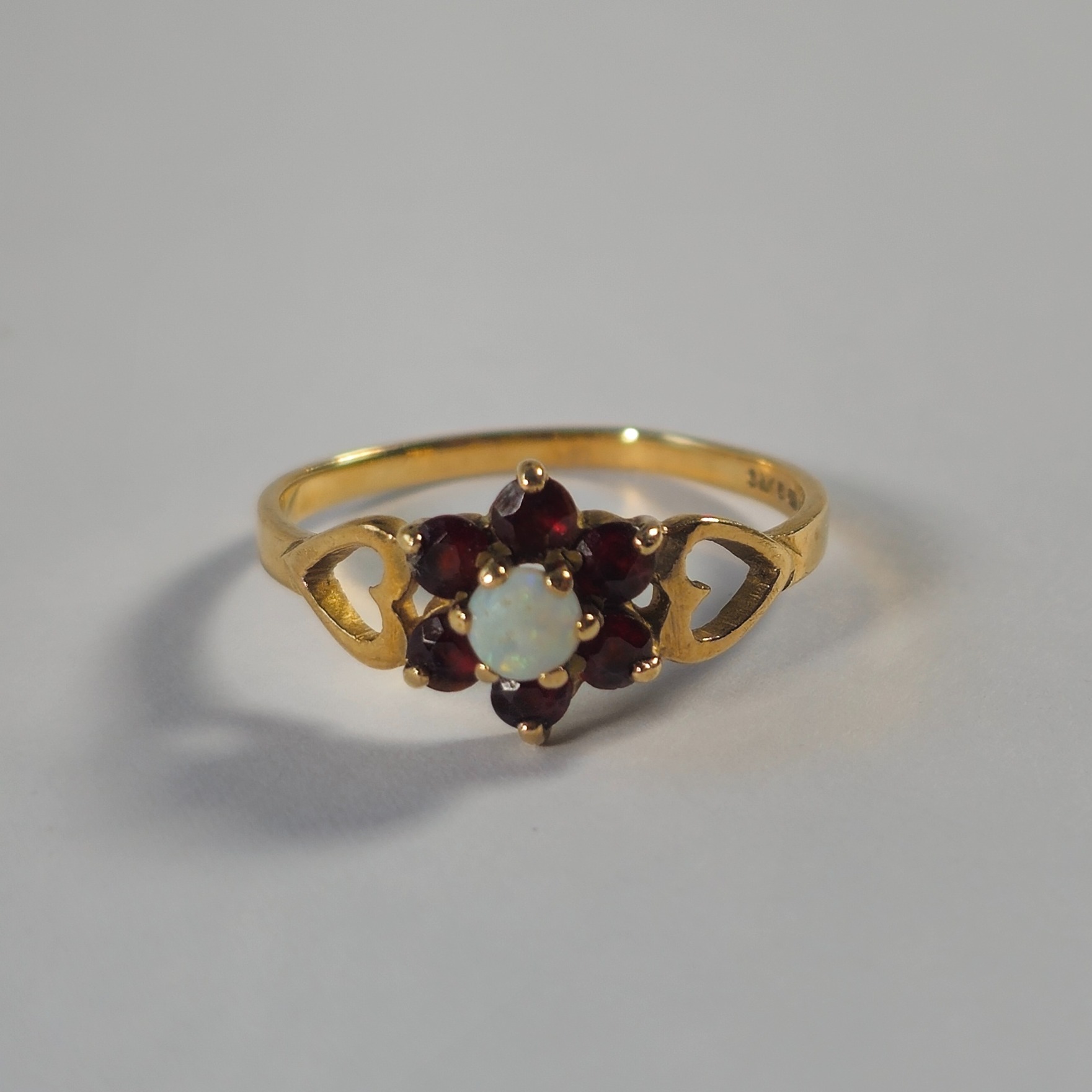 Product photo for 9ct Gold Opal & Garnet Flower Ring Size O1/2