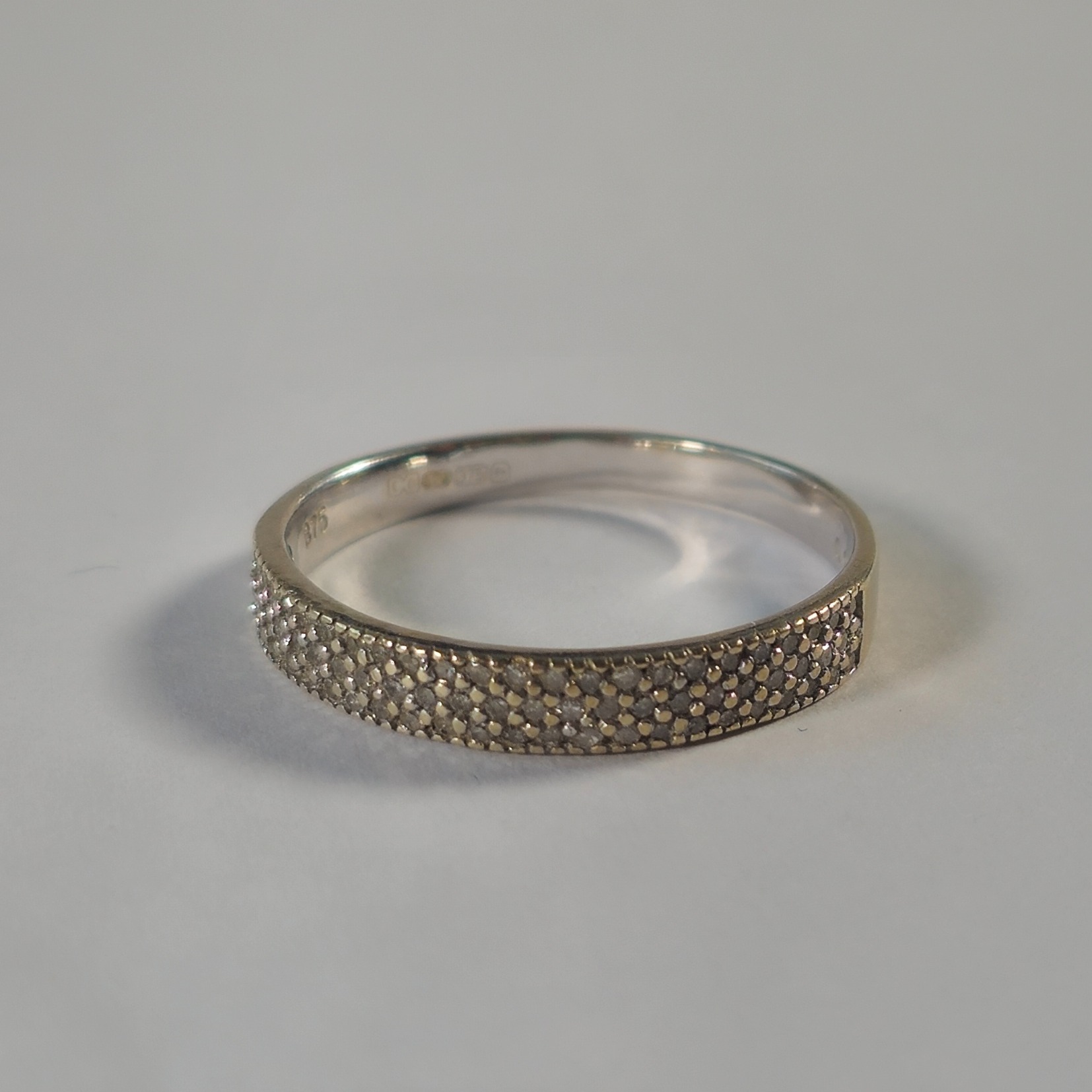 Product photo for 9ct White Gold 0.25ct Pave Diamond Half Band Ring Size R