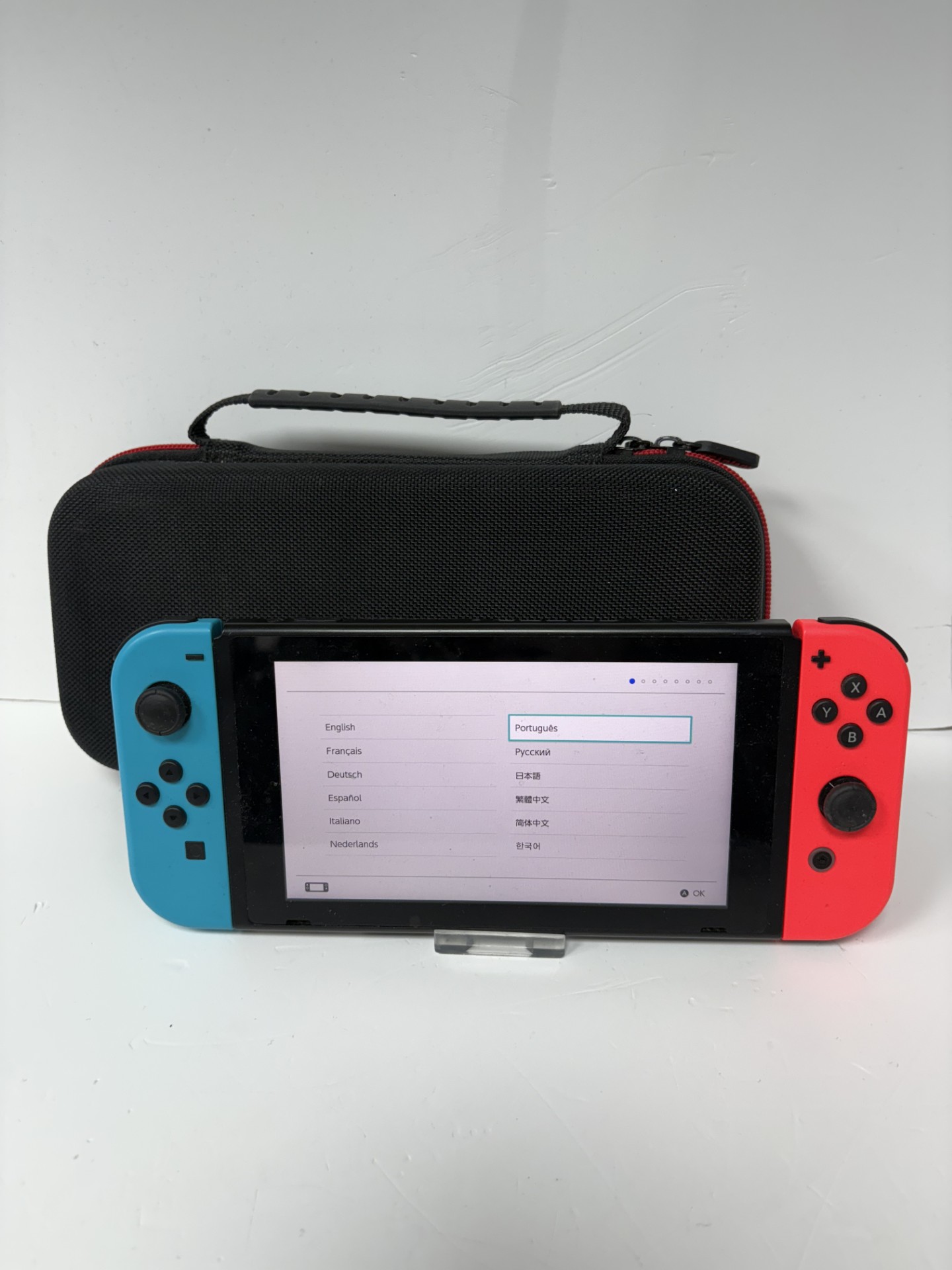 Product photo for nintendo switch 32gb black with blue/red joy cons 3 games unboxed