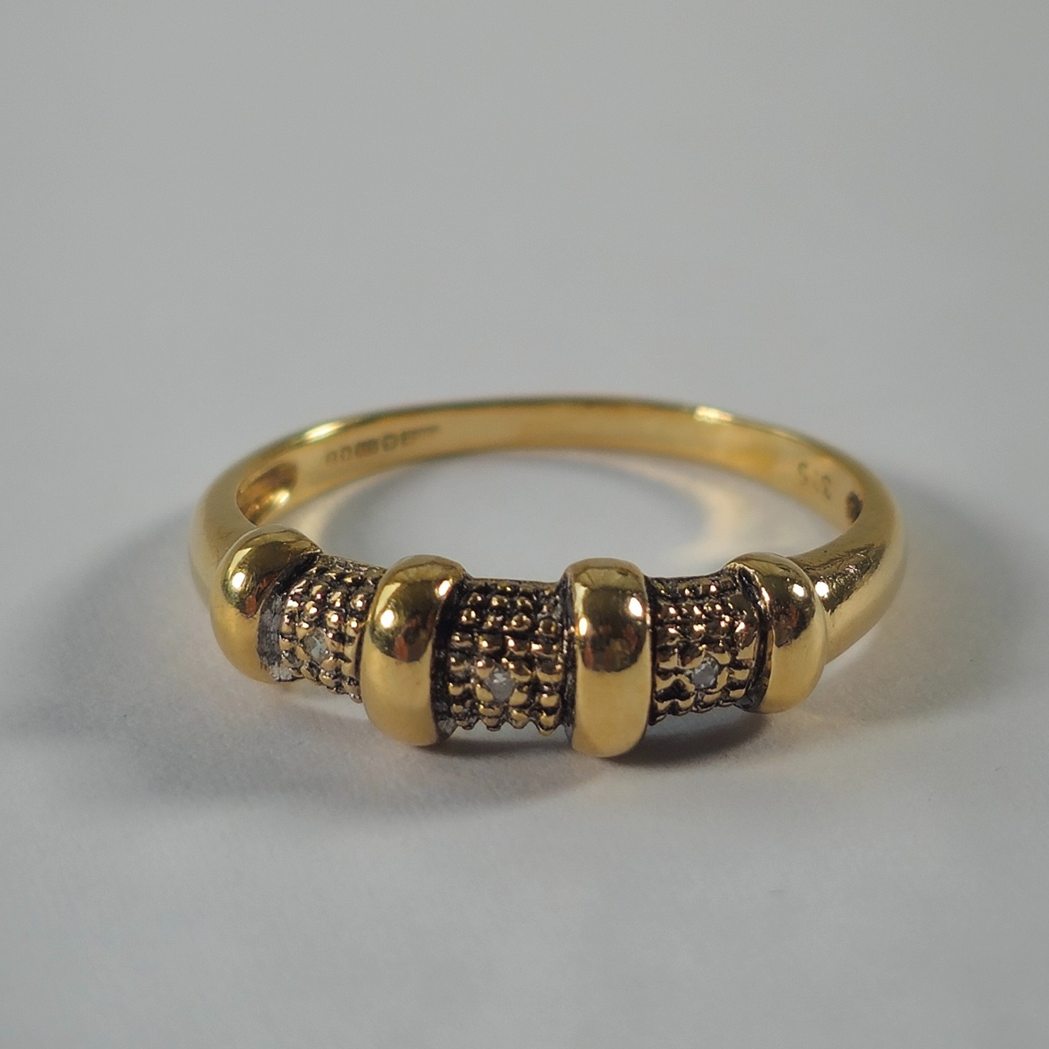 Product photo for 9ct Gold Tiny White Stone Half Band Style Ring Size O
