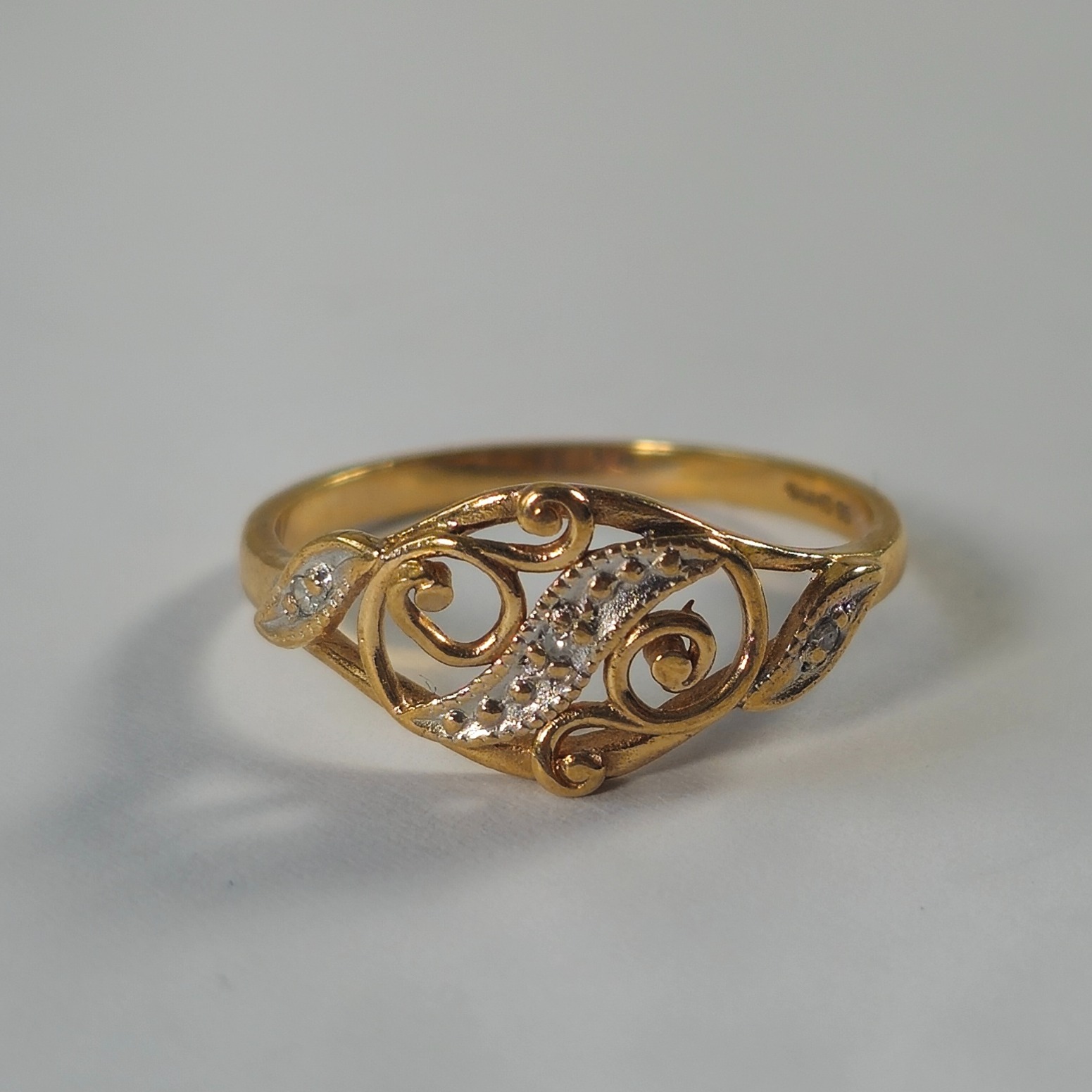 Product photo for 9ct Gold Tiny Diamond Floral oval Pattern Pierced Dress Ring Size N