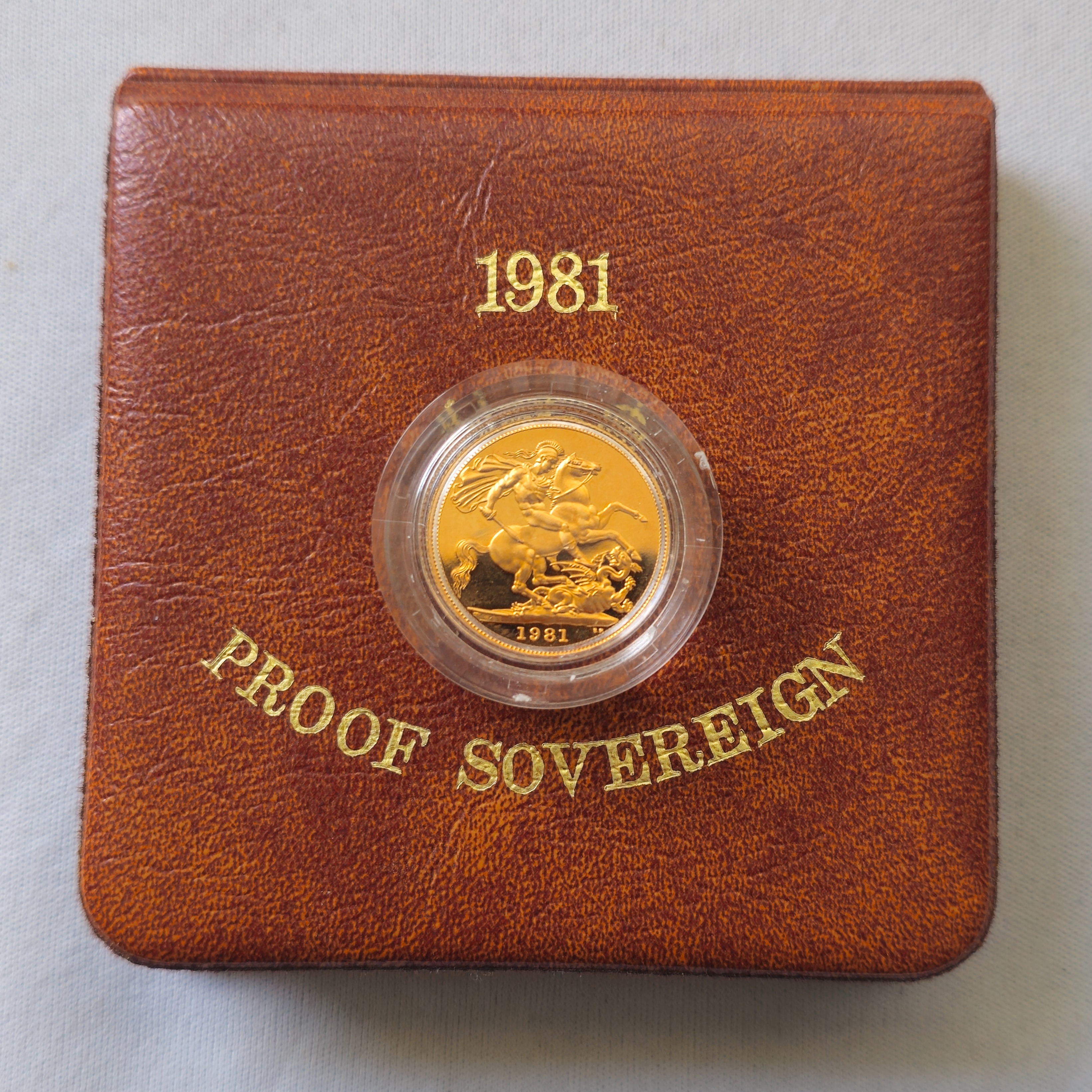 Product photo for 22ct Gold 1981 Elizabeth II and St George & the Dragon Full Sovereign in Brown Case Certificate
