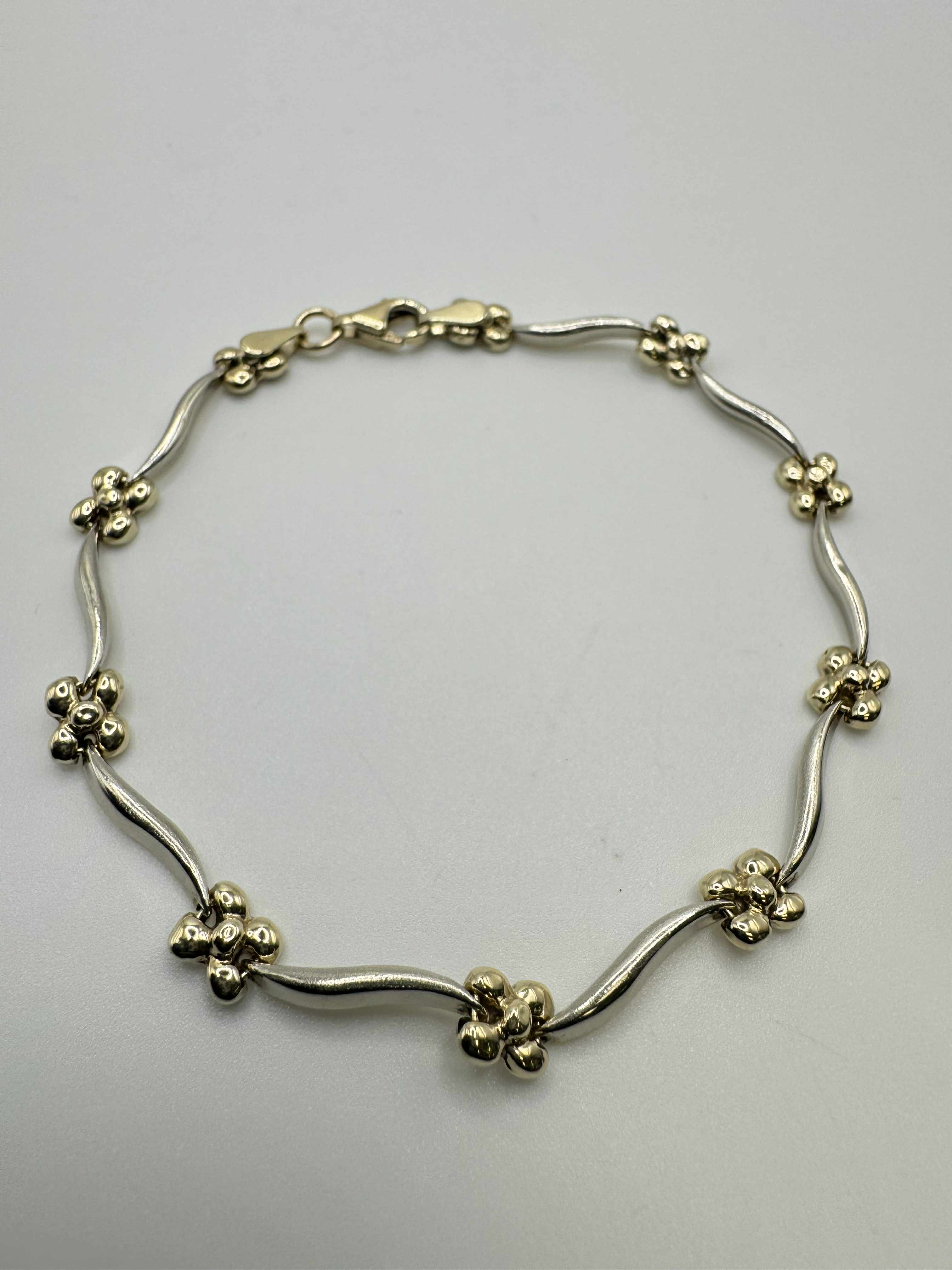 Product photo for 9ct Two Tone Floral Bracelet