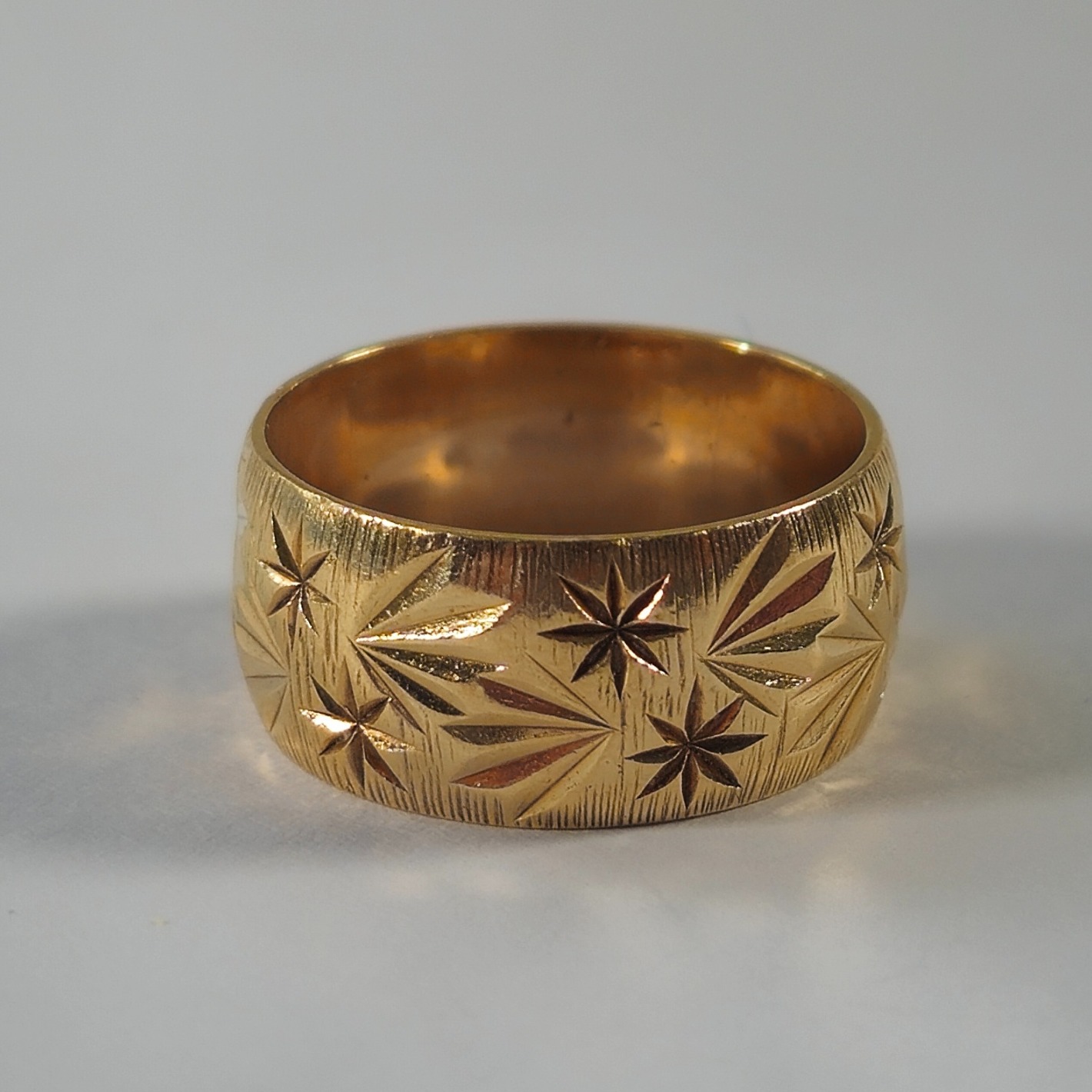 Product photo for 9ct Gold Star Pattern Wide Wedding Band Ring Size L1/2