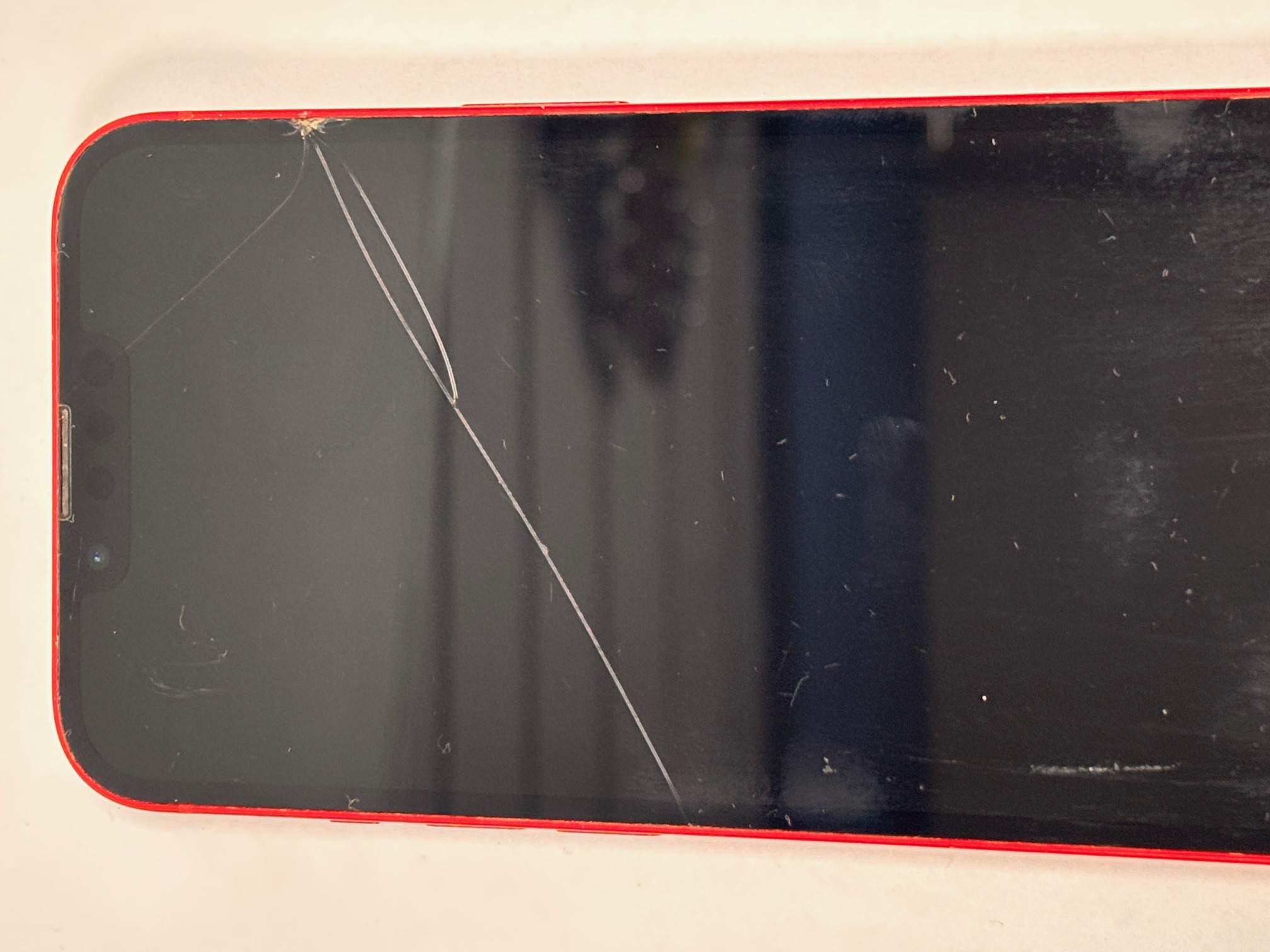 Product photo for Apple IPHONE 13 128GB 87%BH CRACK ON FRONT SCREEN