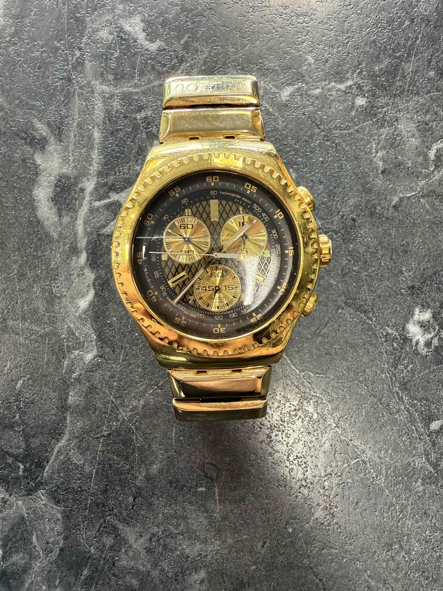 Product photo for 007TM Gold Plated Swatch Watch
