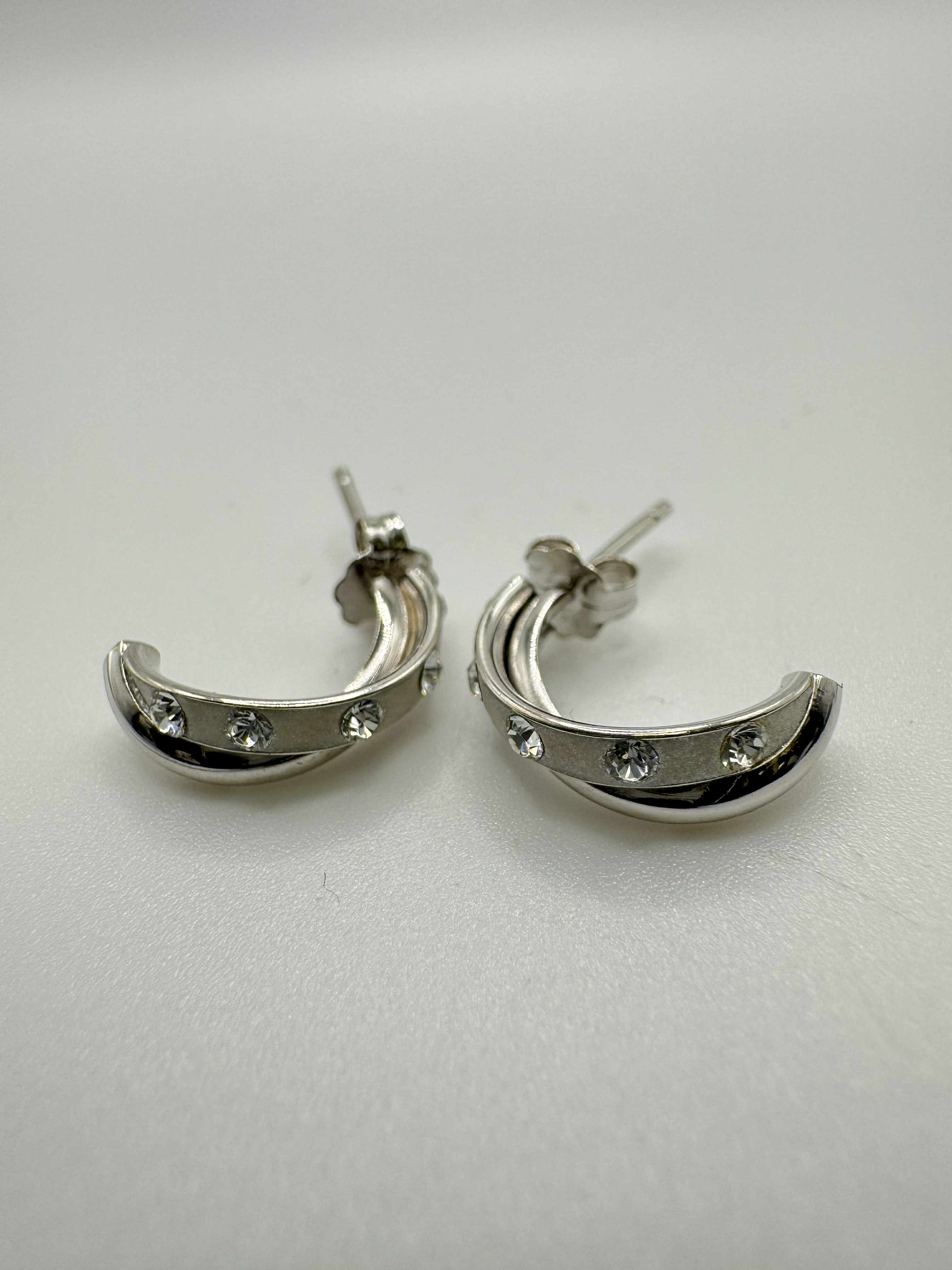Product photo for 9ct White Gold CZ Huggie Earrings