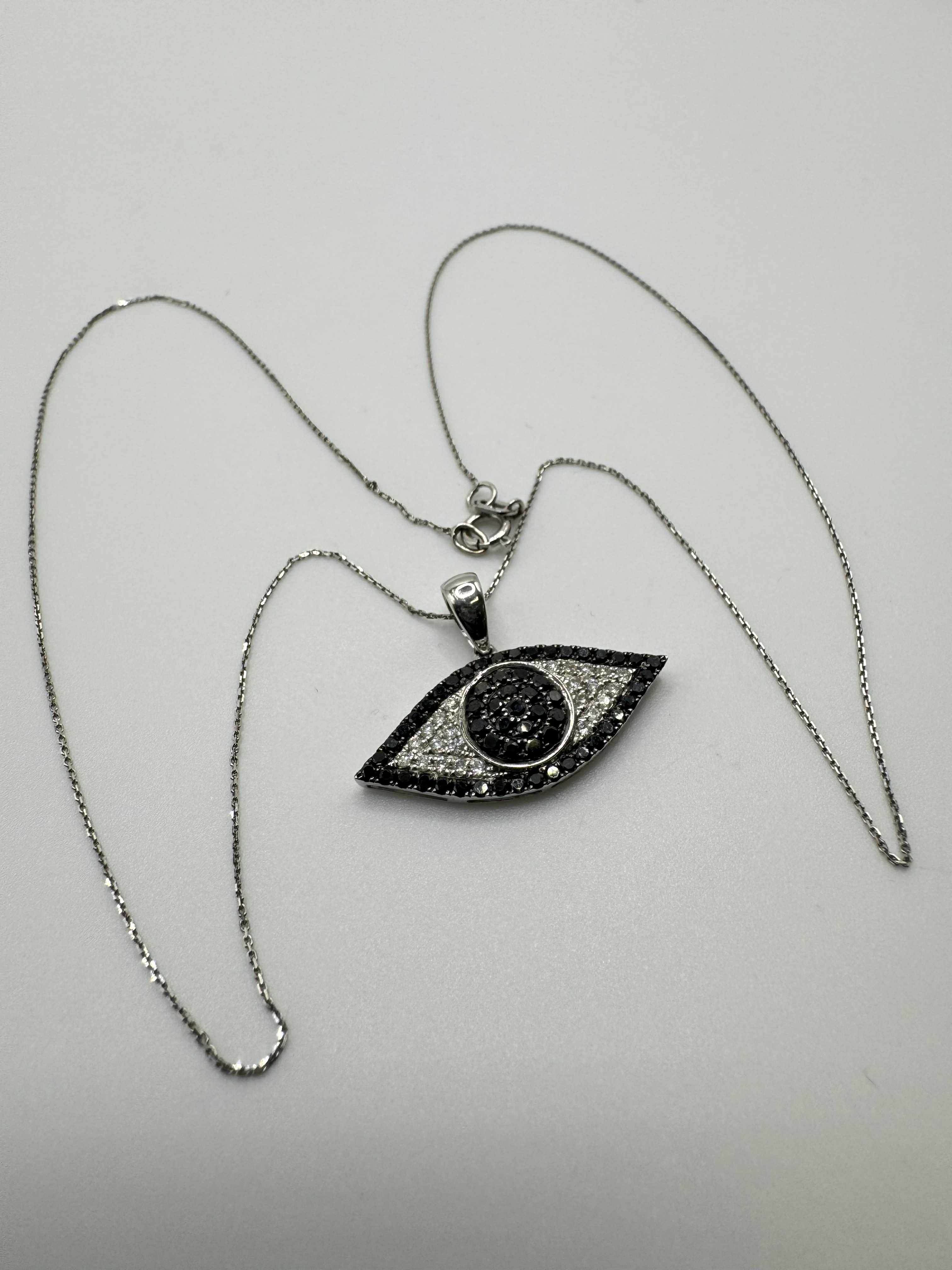 Product photo for 18ct White Gold Chain & Black Diamond Eye Pendant
