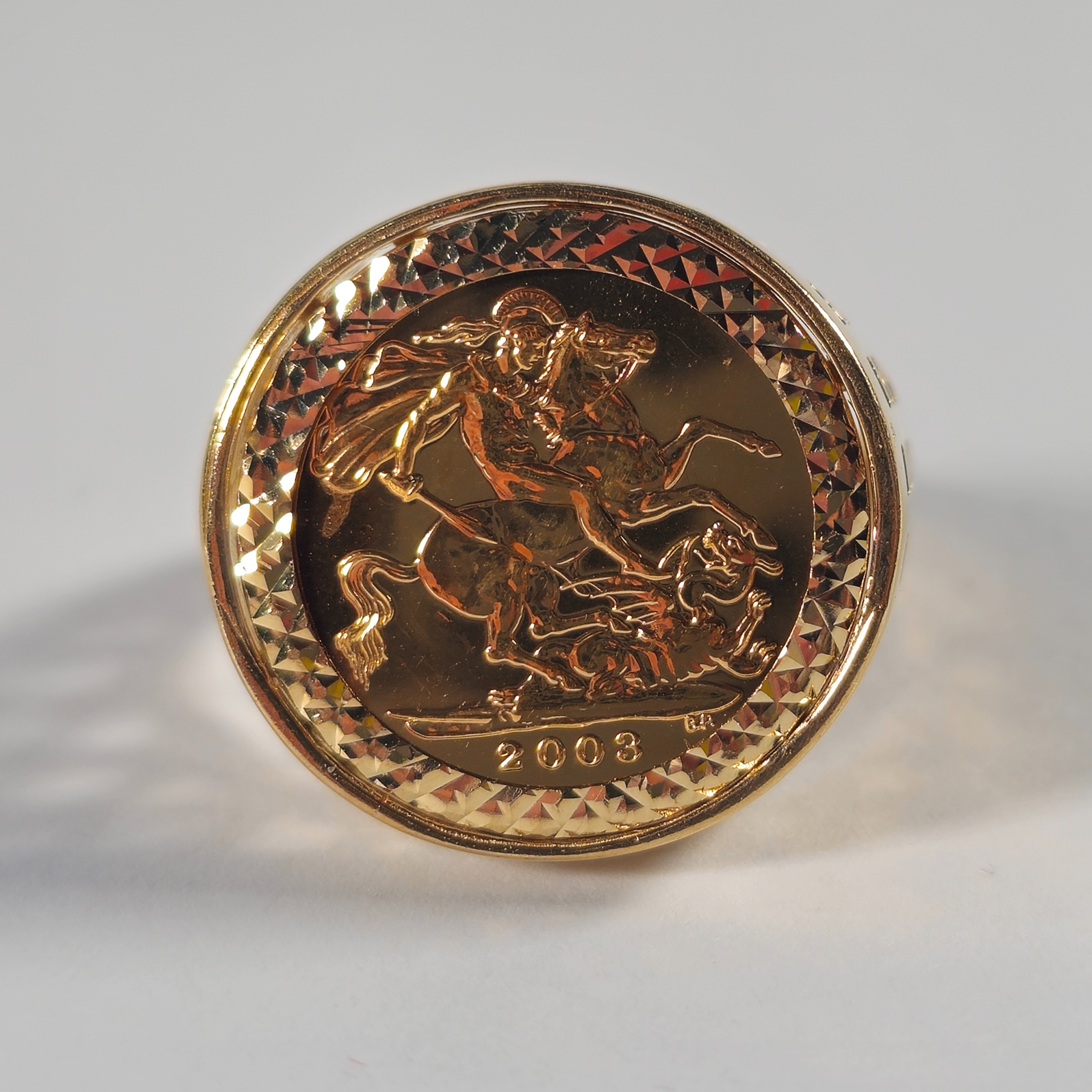 Product photo for 22ct Gold 2003 Queen Elizabeth and St George & the Dragon Half Sovereign in a 9ct Ring Mount Size