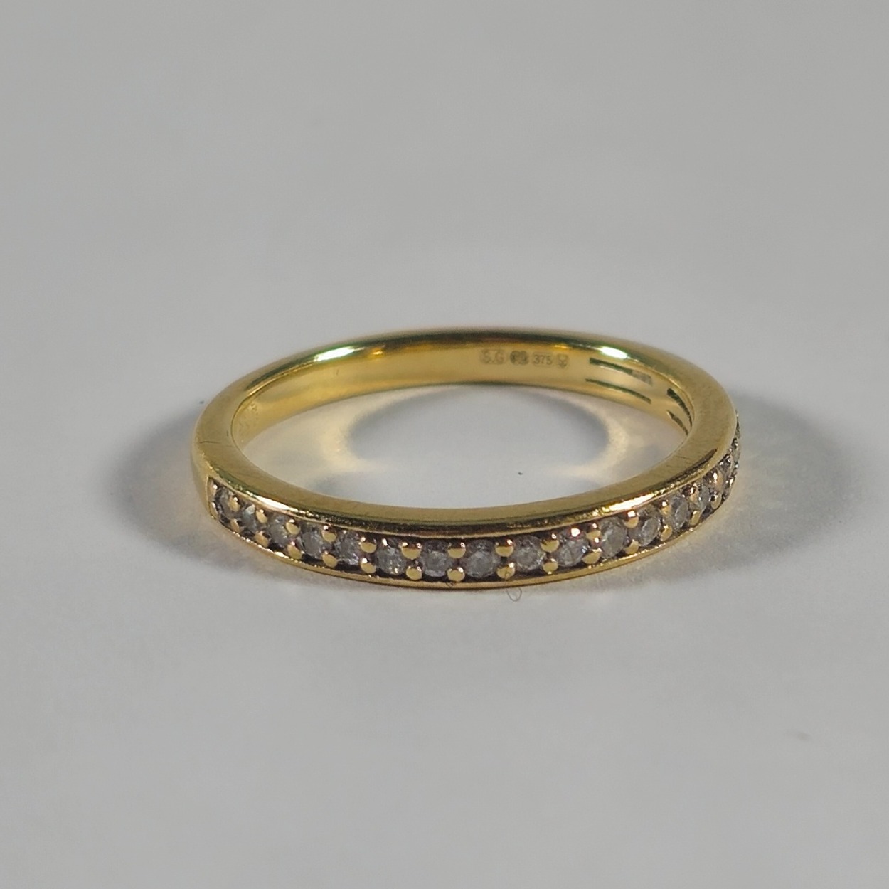 Product photo for 9ct Gold 0.20ct Diamond Half Band Ring Size K1/2