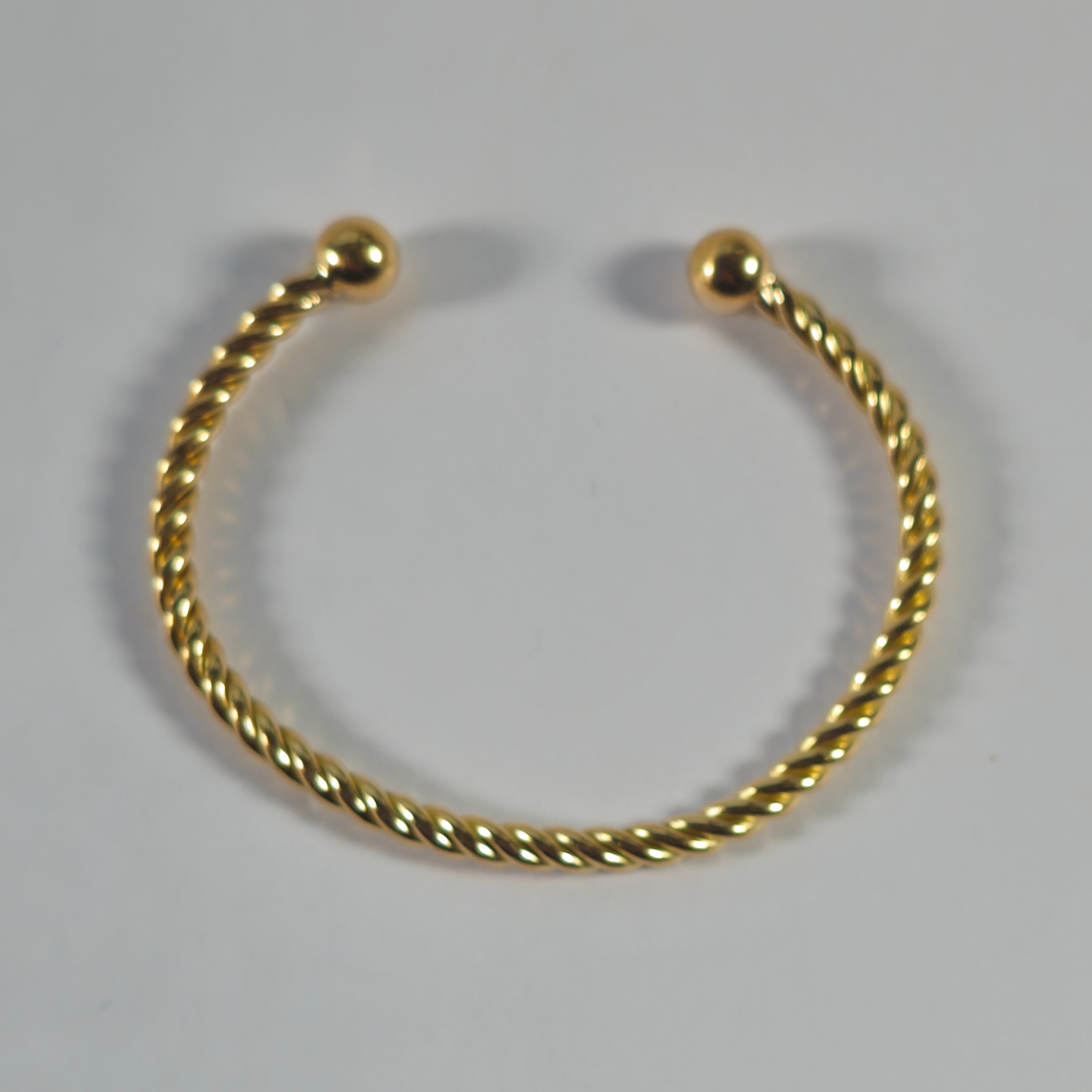 Product photo for 9ct Gold Twisted Cuff Bangle