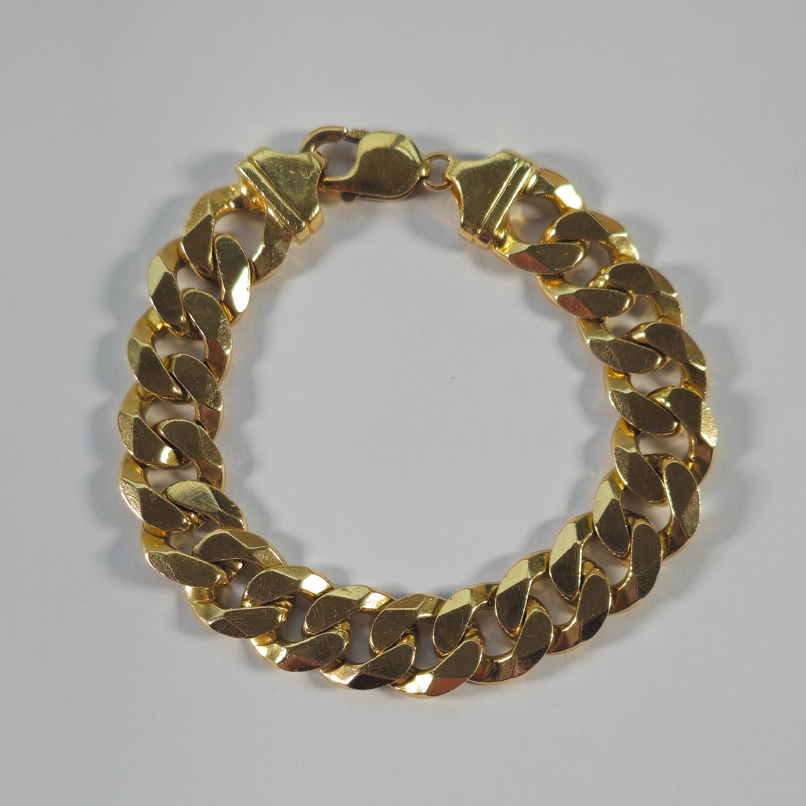 Product photo for 9ct Gold Curb Bracelet 8.4