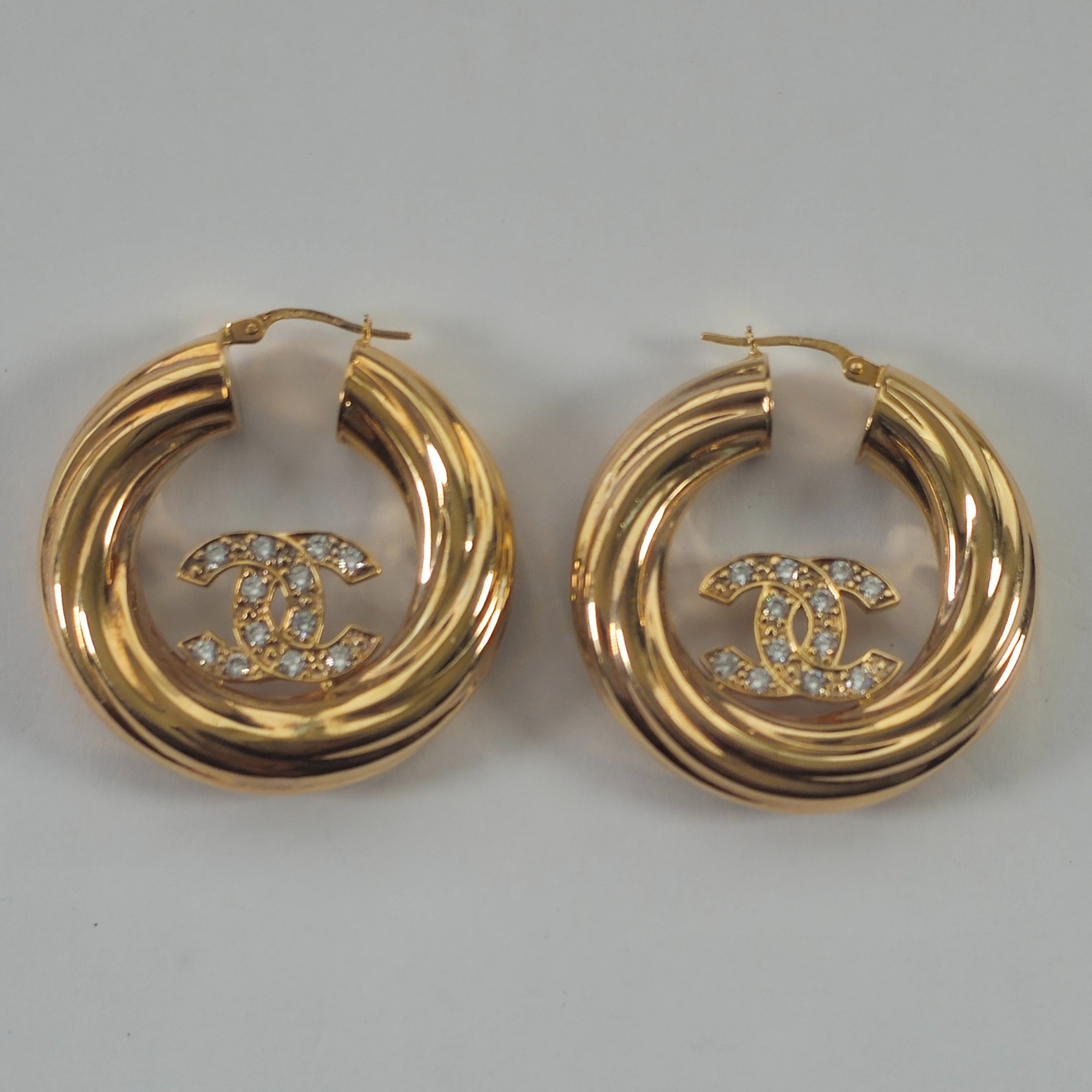 Product photo for 9ct Gold CC *CZ* Twisted Round Hoop Earrings