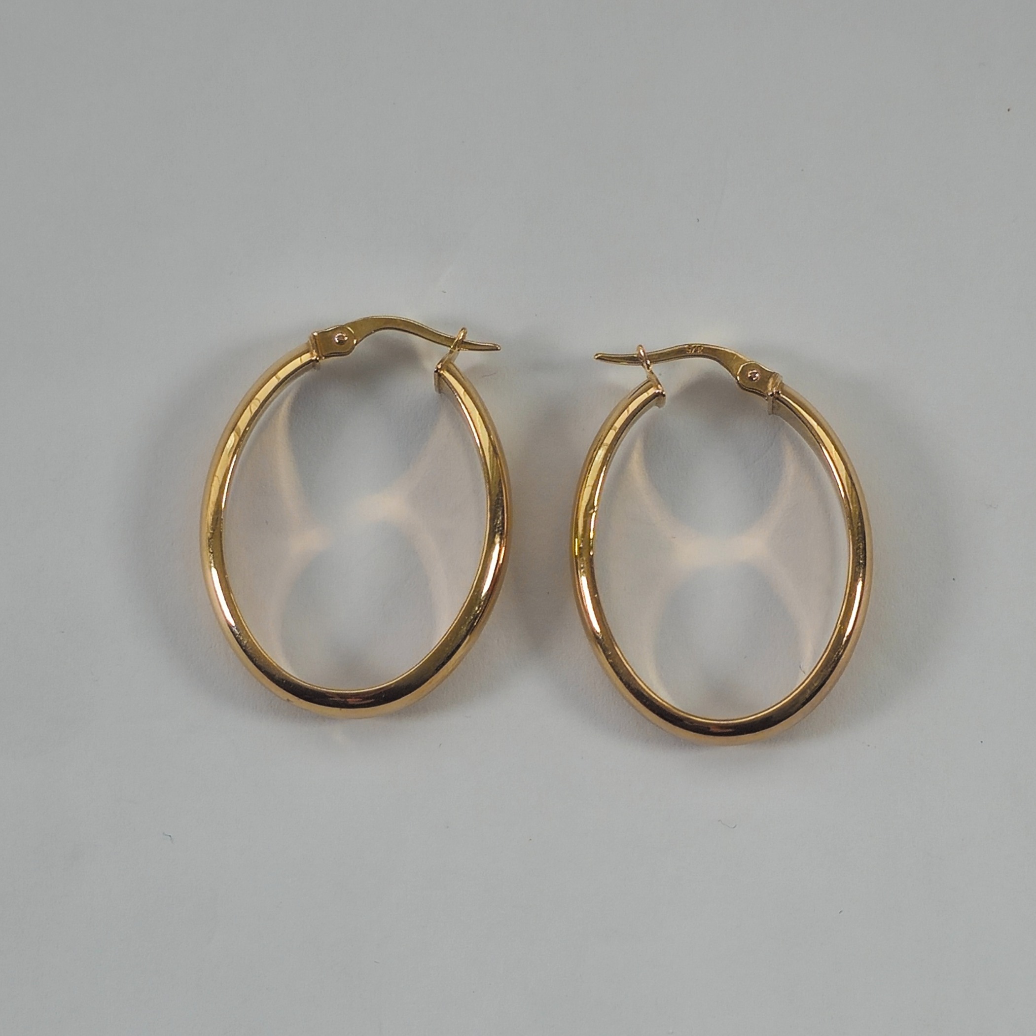 Product photo for 9ct Gold Hollow Plain Oval Hoop Earrings