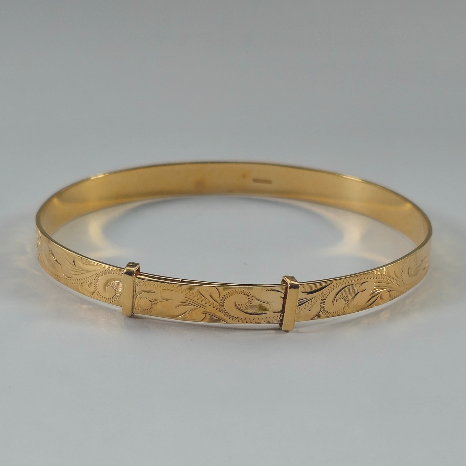 Product photo for 9ct Gold Floral Adjustable Bangle