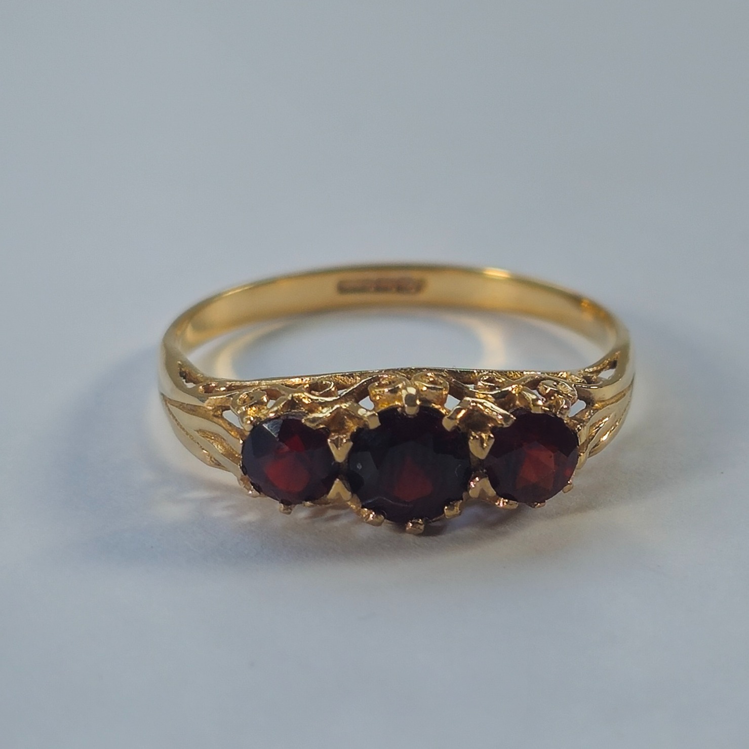 Product photo for 9ct Gold Red Garnet Half Band Ring Size P1/2