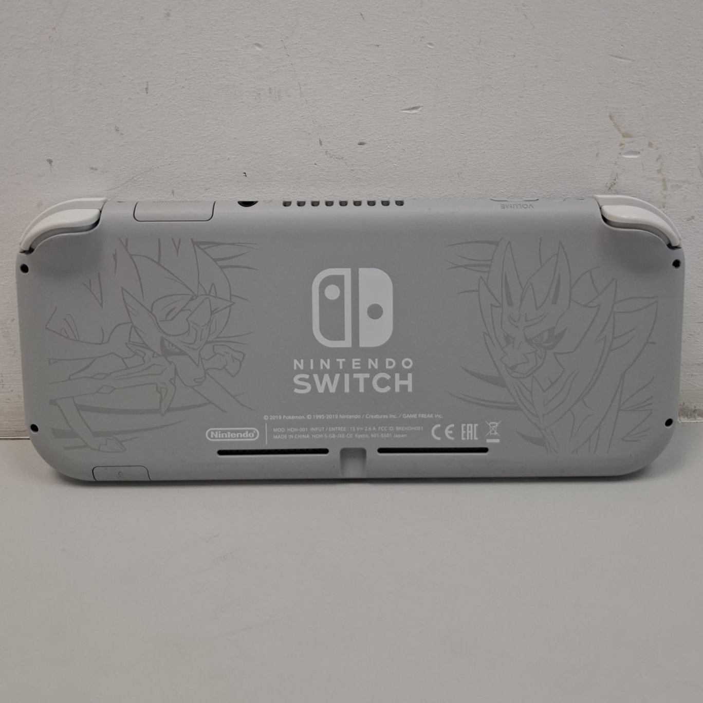 Product photo for Nintendo Switch Lite POKEMON VERSION , 32GB Zacian & Zamazenta Grey