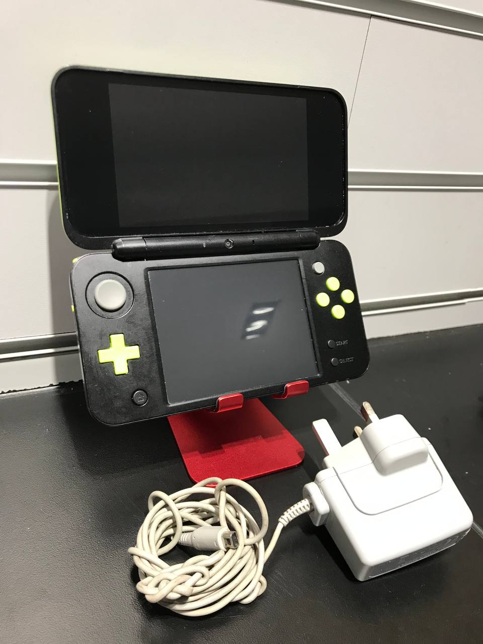 Product photo for Nintendo NEW 2DS XL Console, w/AC Adapter, Black & Lime Green