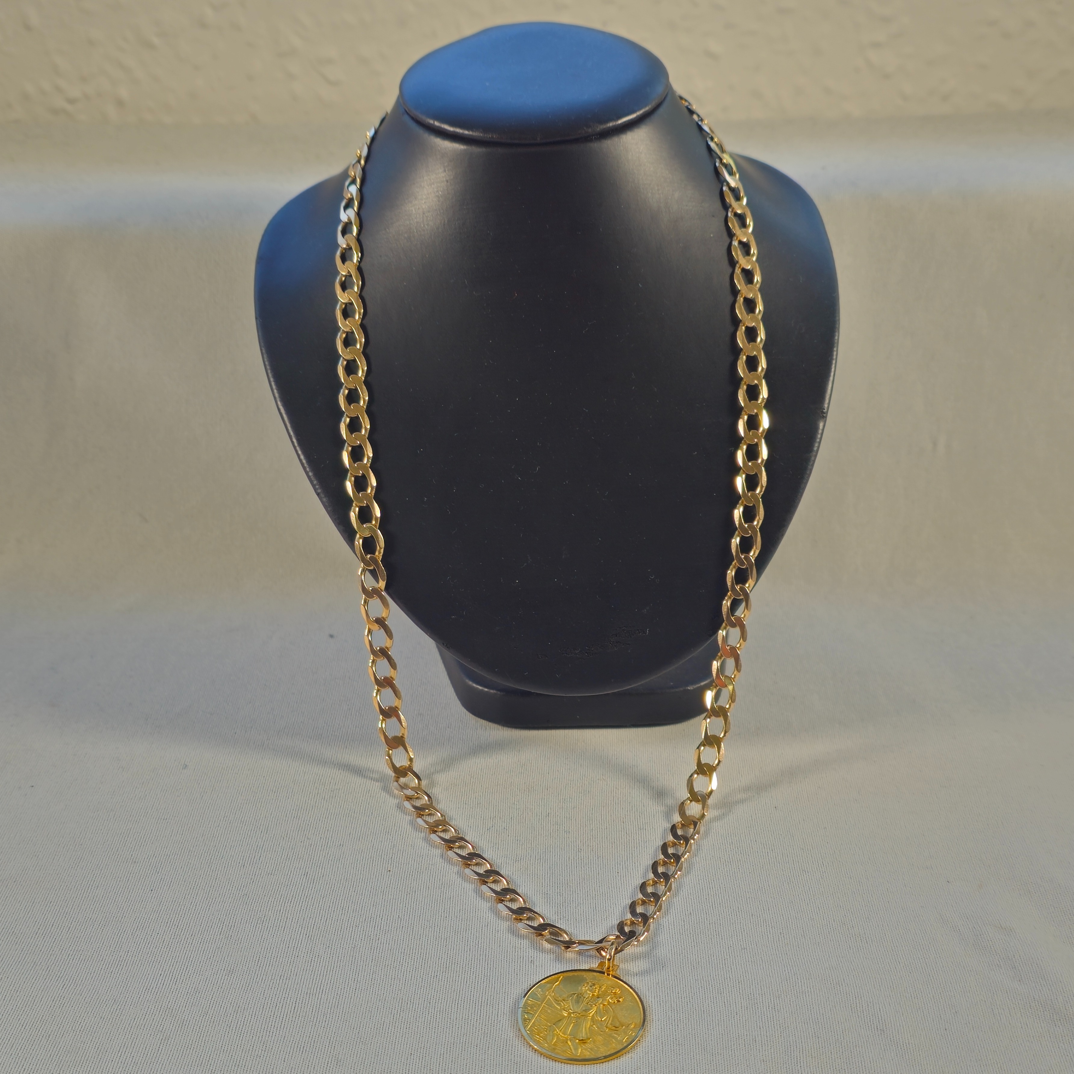 Product photo for 9ct Gold Curb Chain & St. Christopher Pendant 24.60