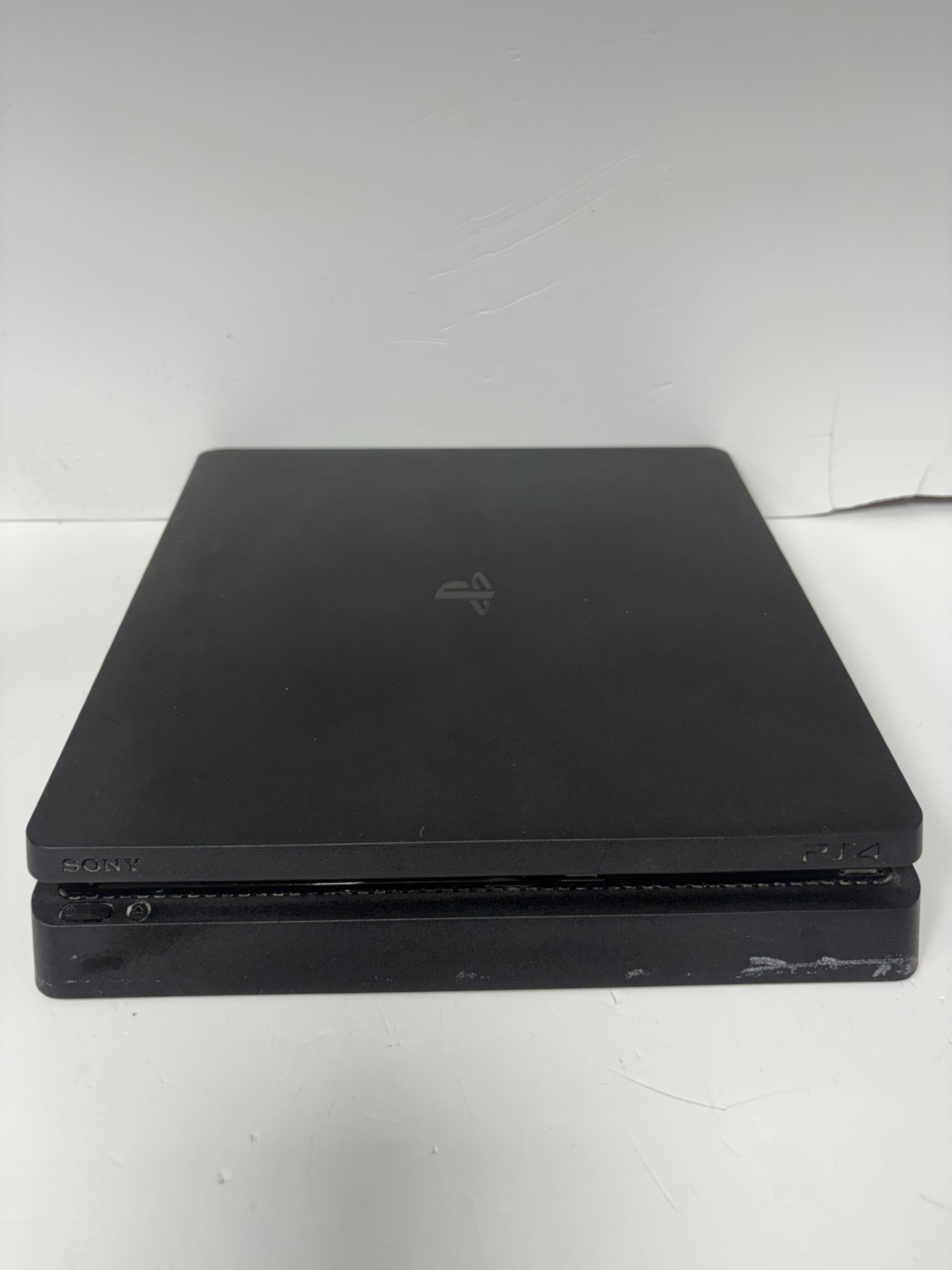 Product photo for SONY ps4 slim 500GB black unboxed