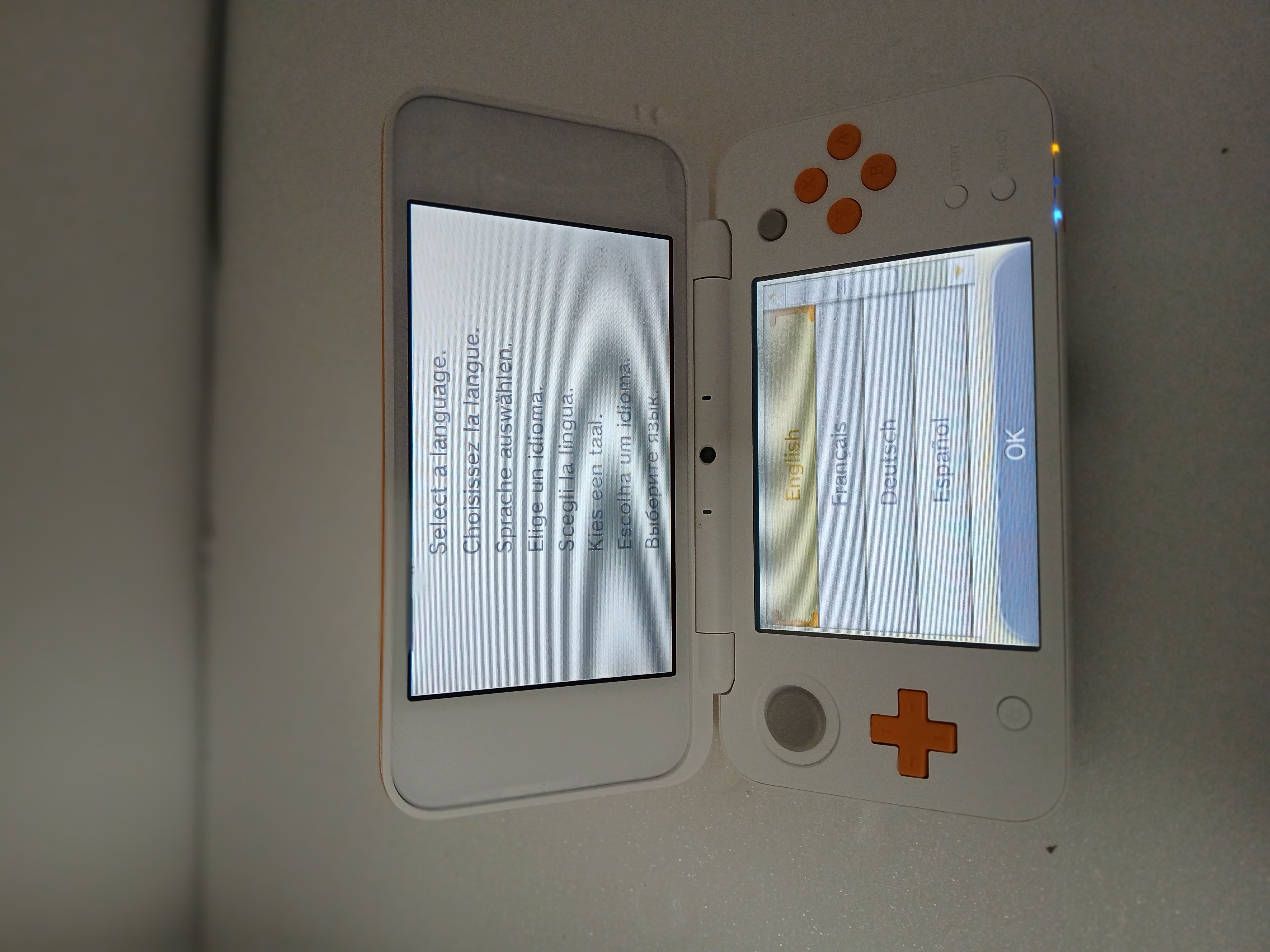 Product photo for NEW 2DS XL Console, w/AC Adapter, White & Orange, Unboxed