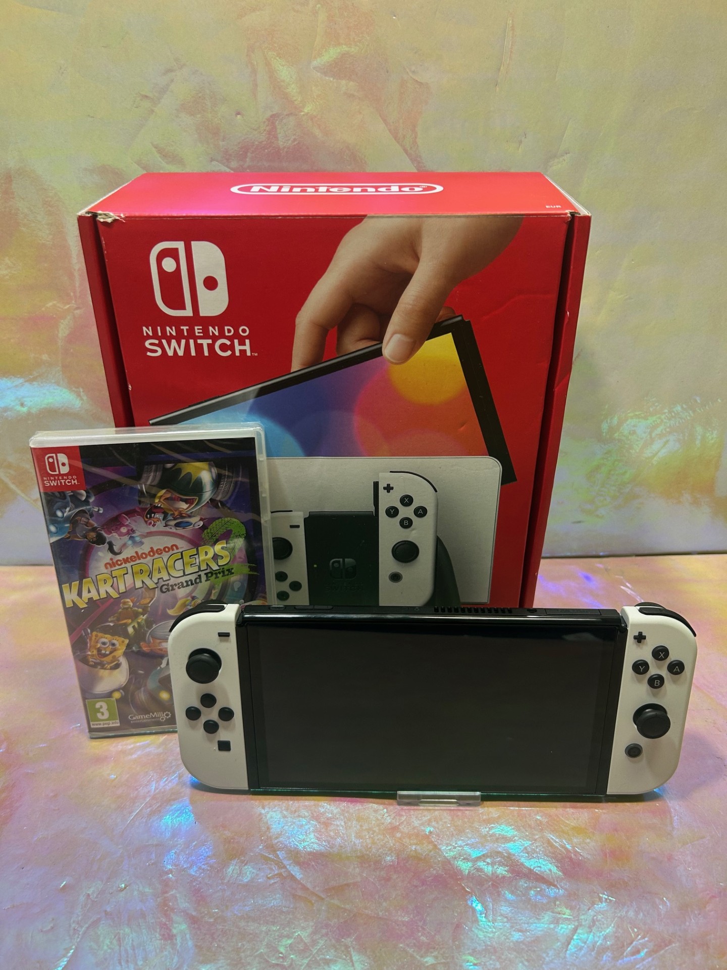 Product photo for Nintendo Switch OLED - White & Nickelodeon Kart Racers