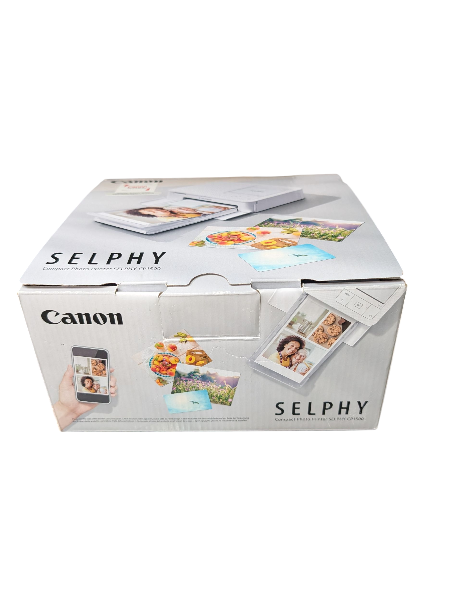 Product photo for Canon SELPHY CP1500 Portable Photo Printer – New in Box (White)