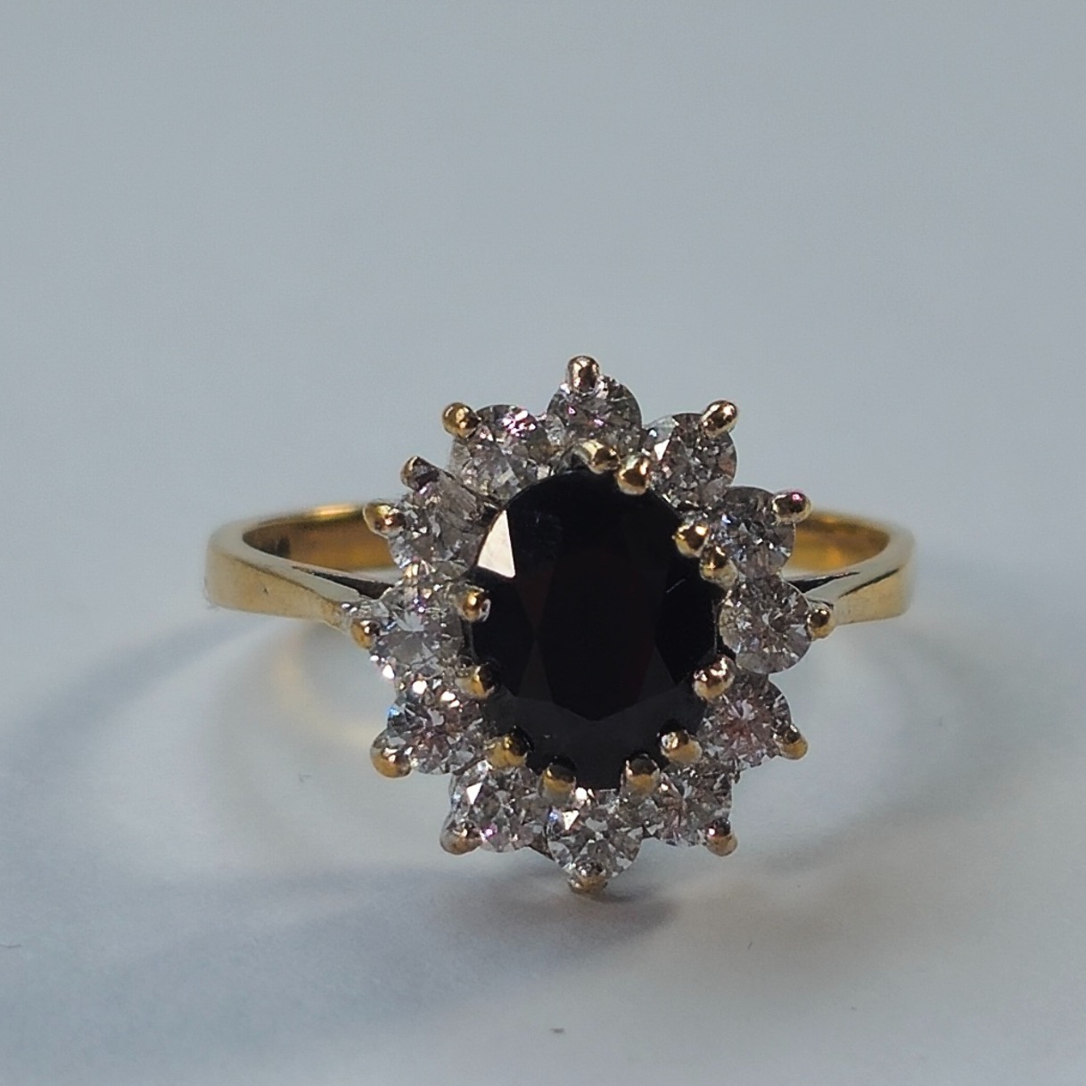 Product photo for 9ct Gold Sapphire & *CZ*Flower Ring Size N