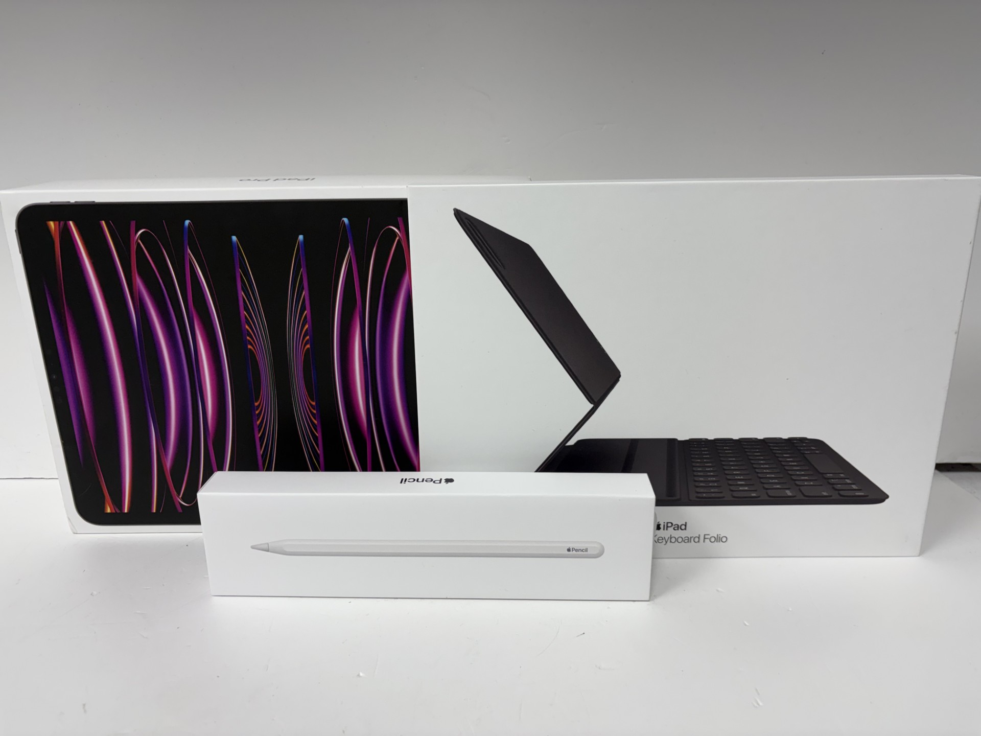 Product photo for APPLE **MANAGERS BUNDLE** IPAD PRO 11INCH 4TH GEN 128GB WIFI AND CELLULAR, SMART KEYBOARD FOLIO, PENCIL 2ND ALL BOXED