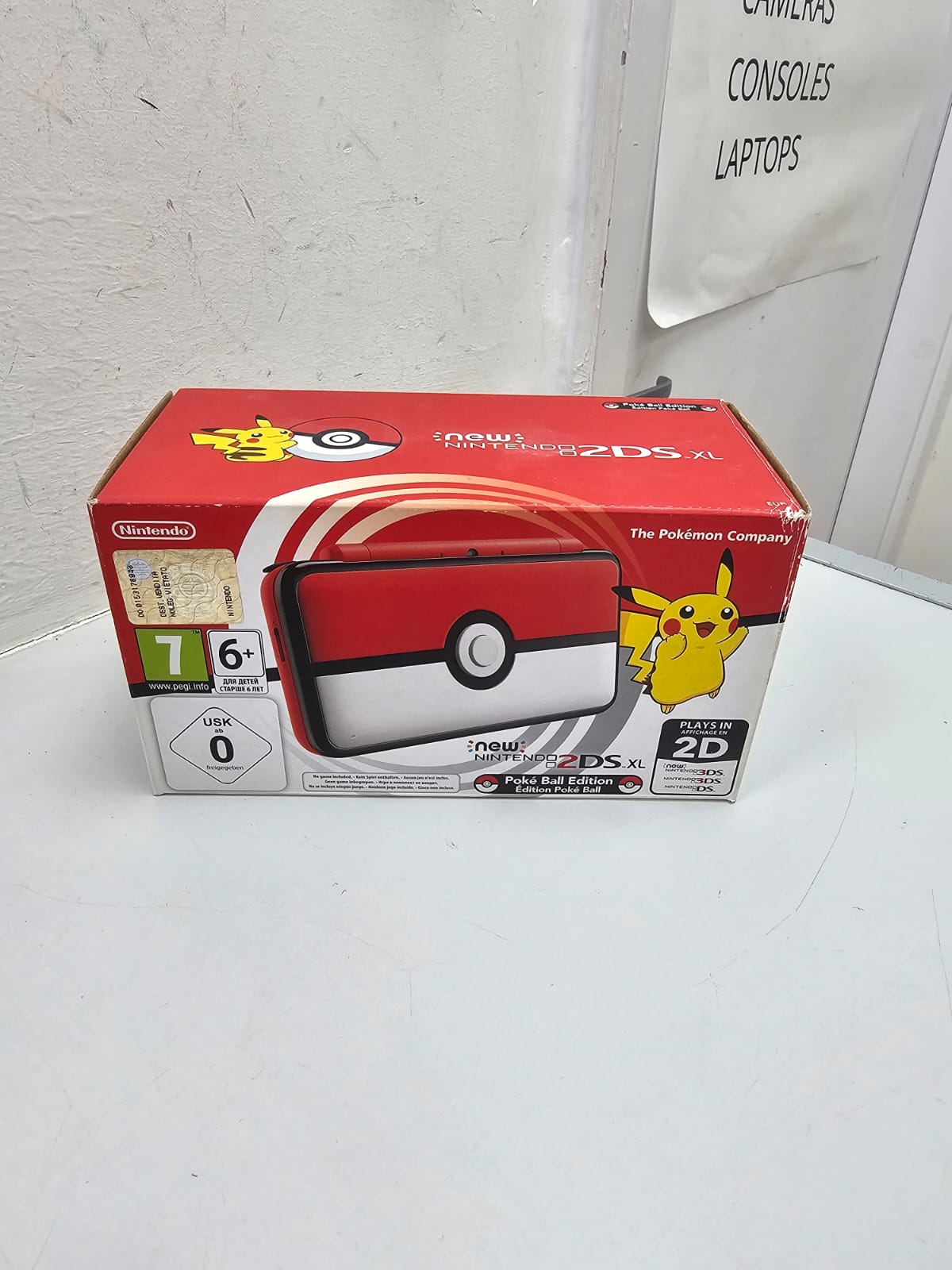 Product photo for New Nintendo 2DS XL - Pokeball Edition Very Good Condition /Charger & Stylus