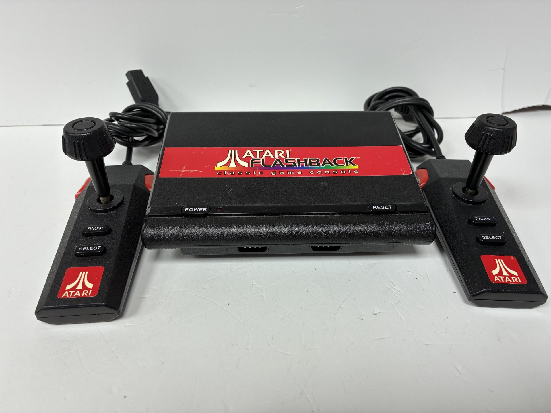 Product photo for Atari flashback console with 2 controller black unboxed