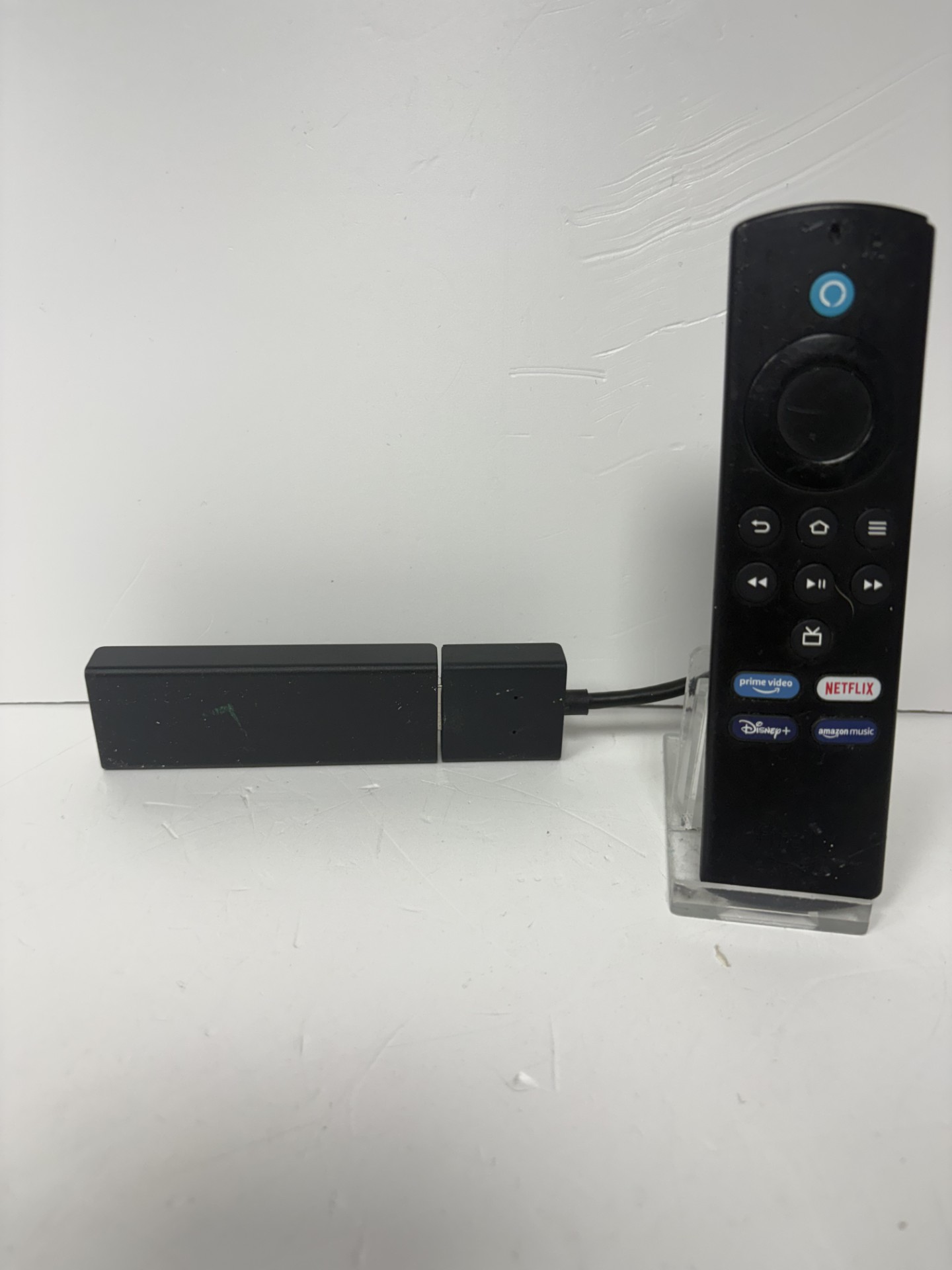 Product photo for Amazon Fire TV Stick Lite HD unboxed