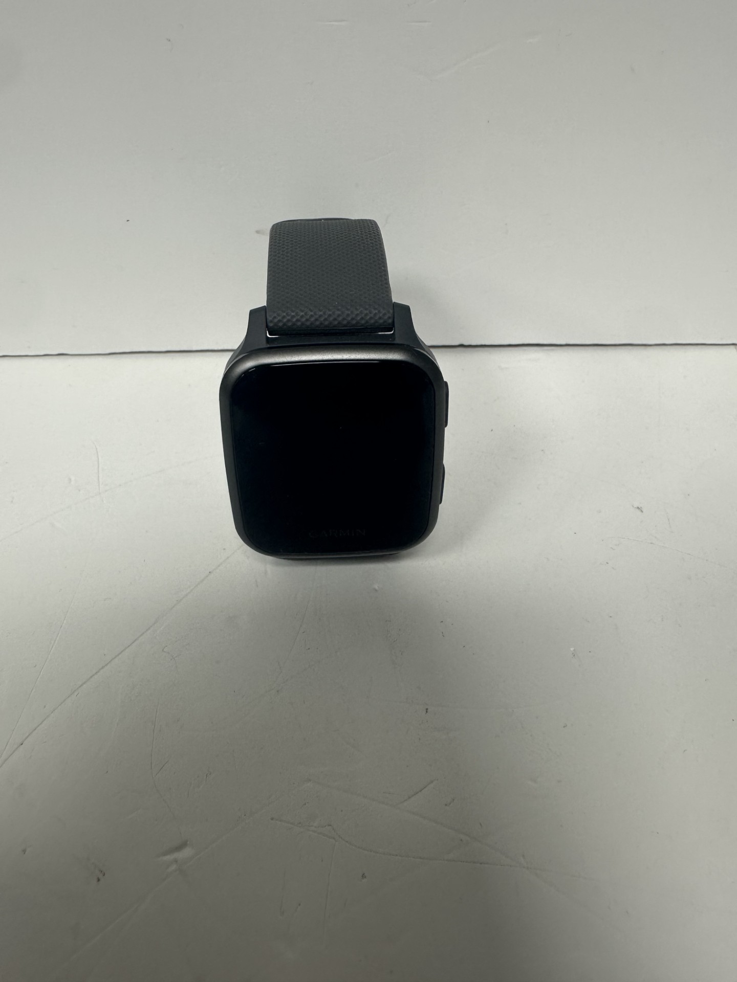 Product photo for Garmin venu sq watch with charger unboxed